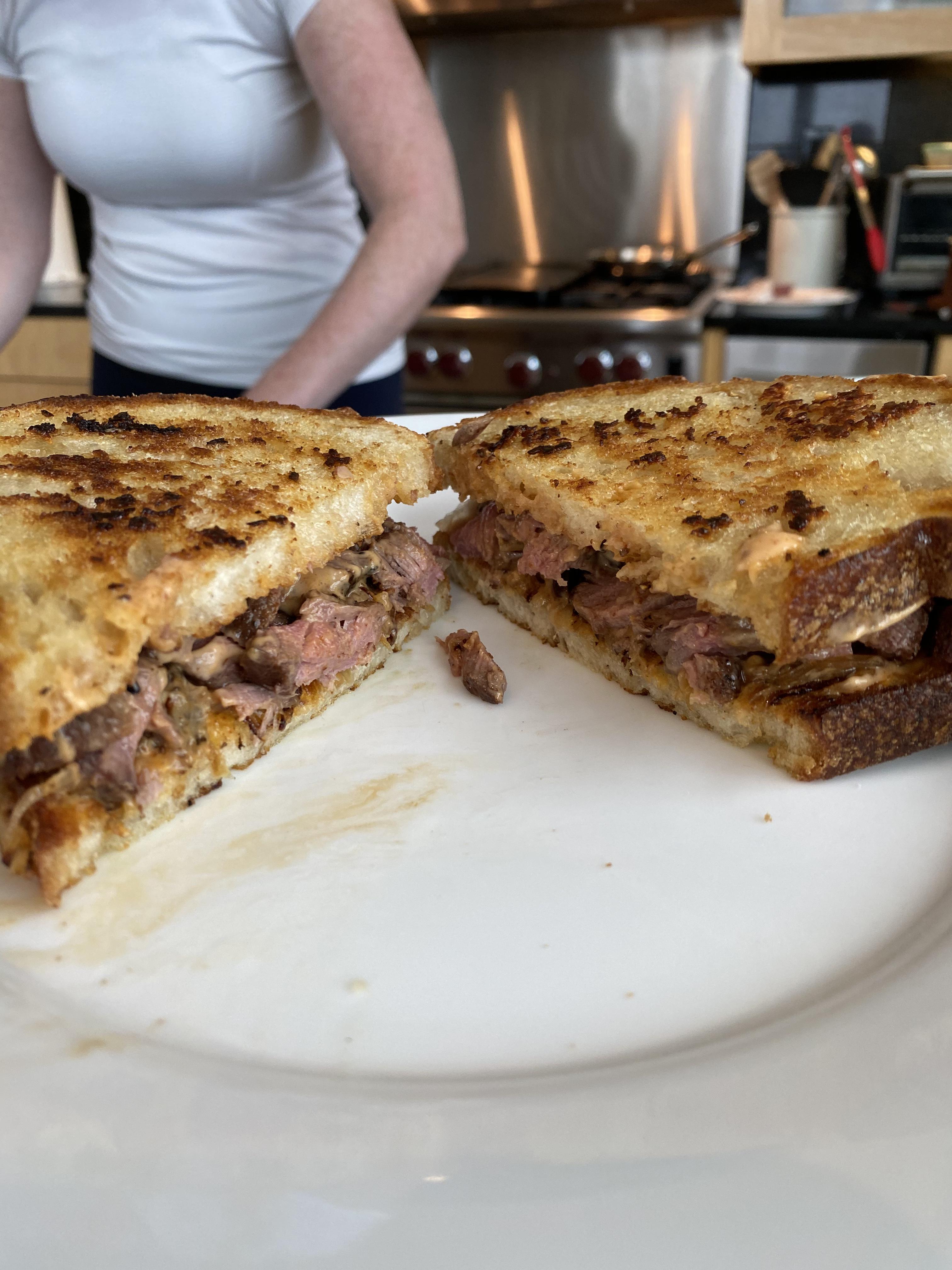 [Homemade] Steak sandwich with sourdough garlic bread and onions r/food