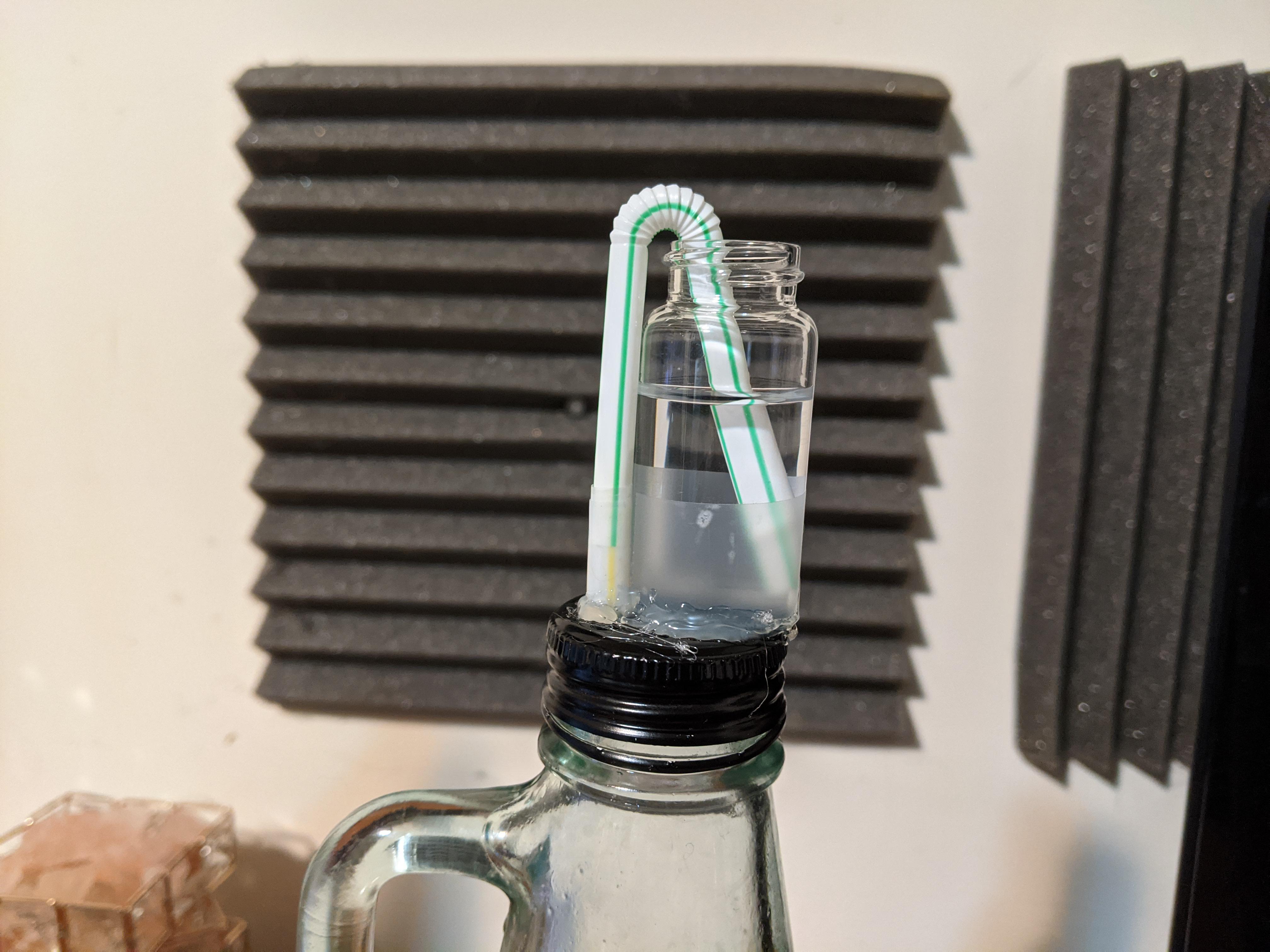 Improvised airlock made with a glass vial and bendy straw r/mead