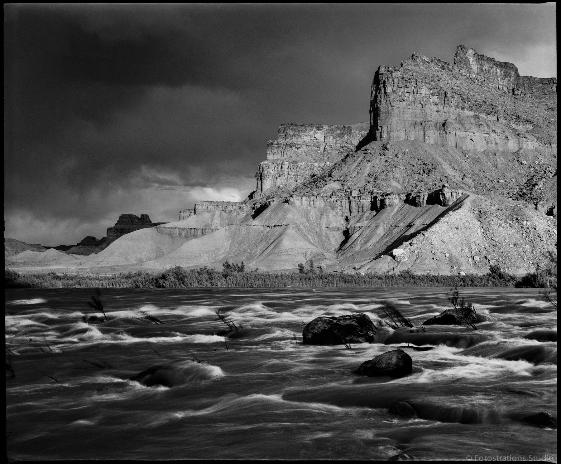 Book Cliffs and the Green River as it flows from Gray Canyon, near the