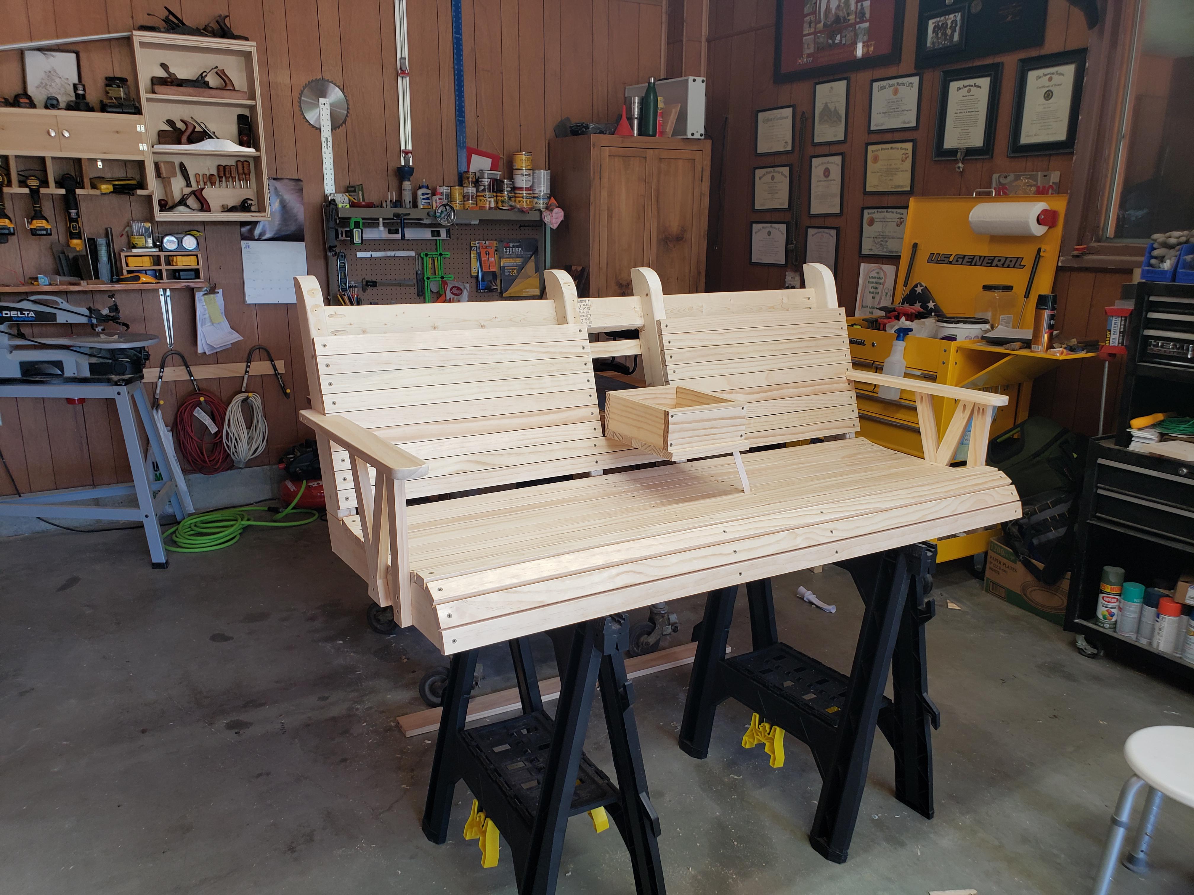 Work in progress. A porch swing with a fold down cup holder. r