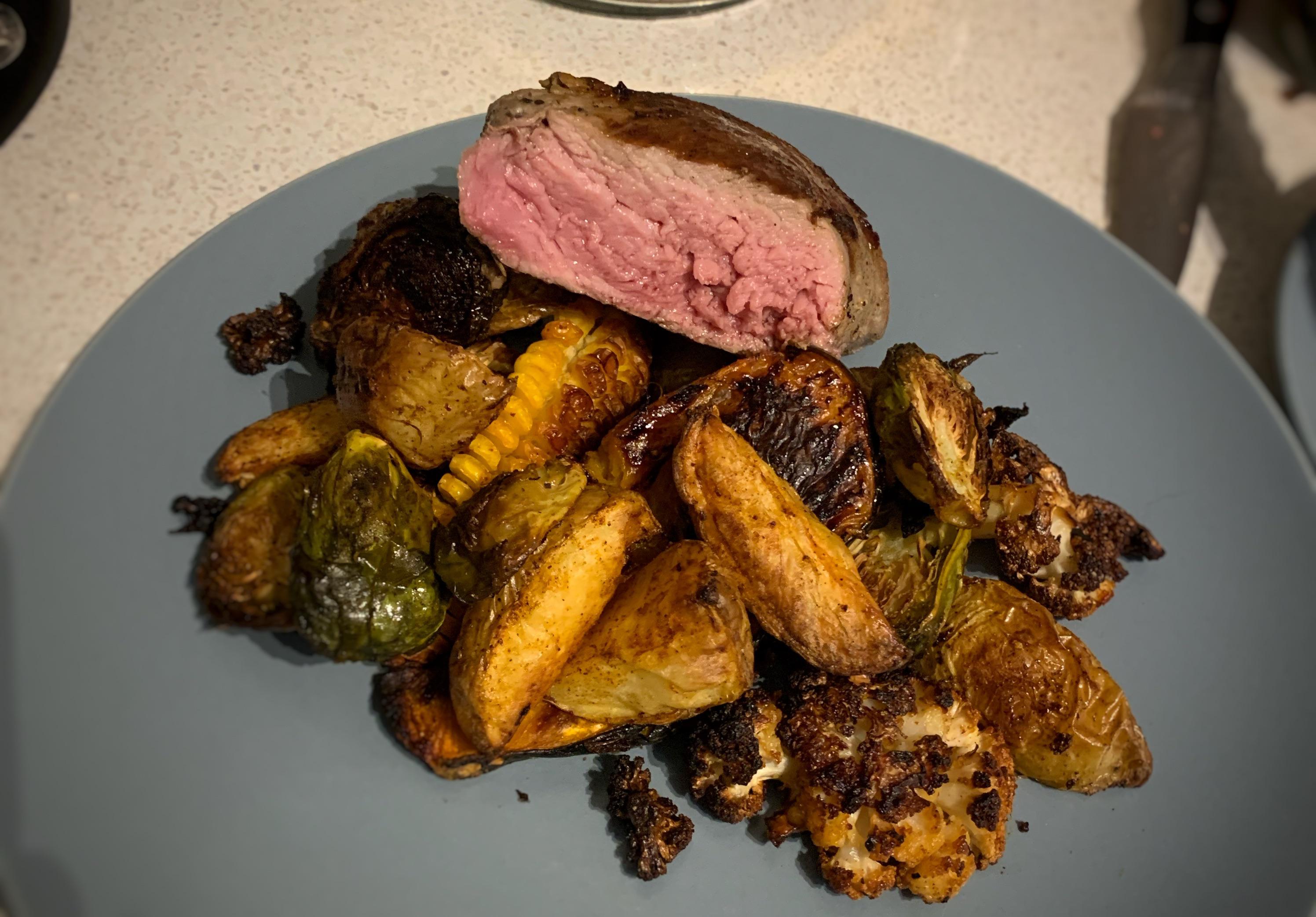 Four hour sous vide veal eye fillet, reverse seared, wiry roast vegetables. Everything has a