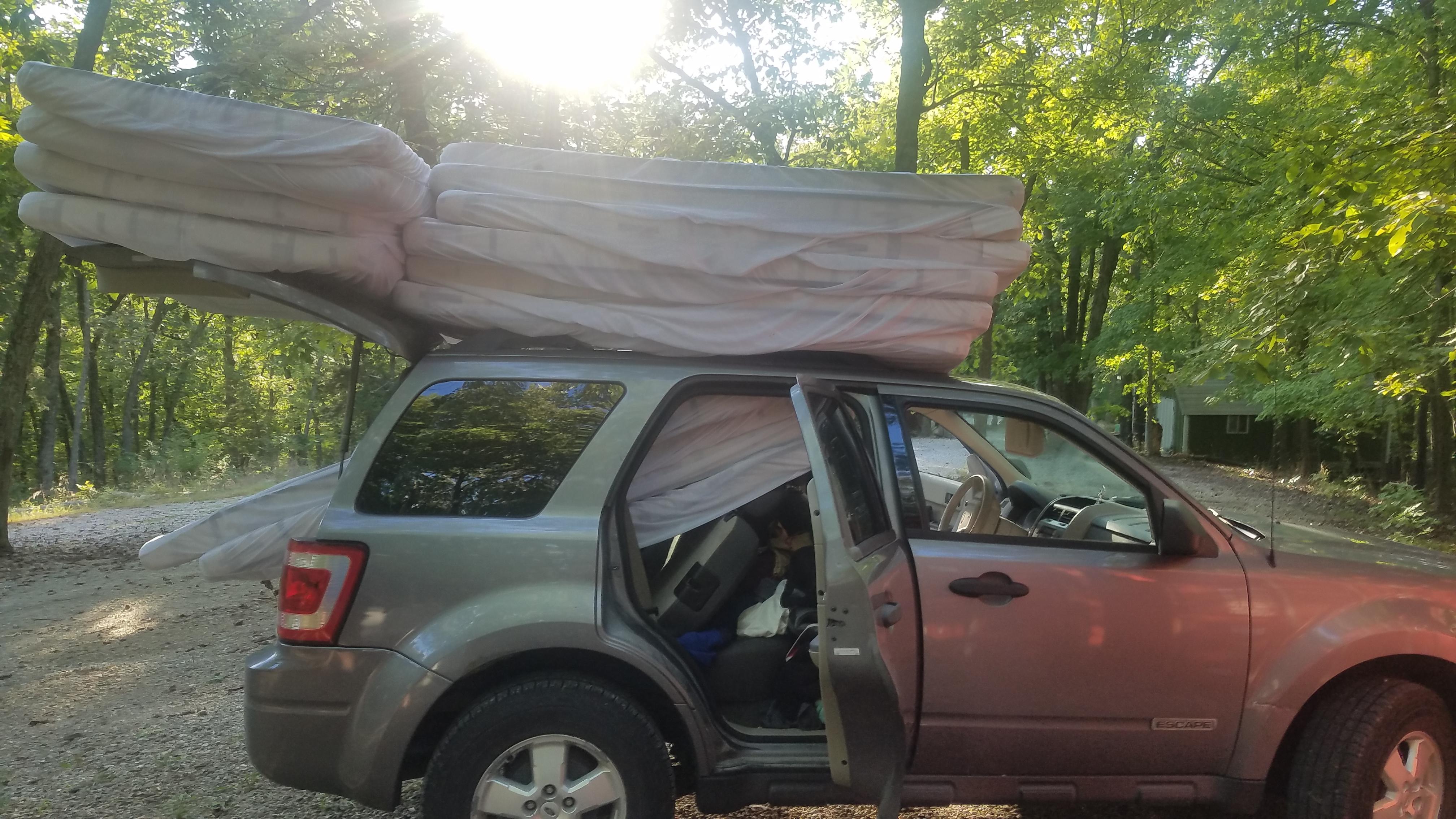 You can fit 12 mattresses on a ford escape. (Driving around a camp not