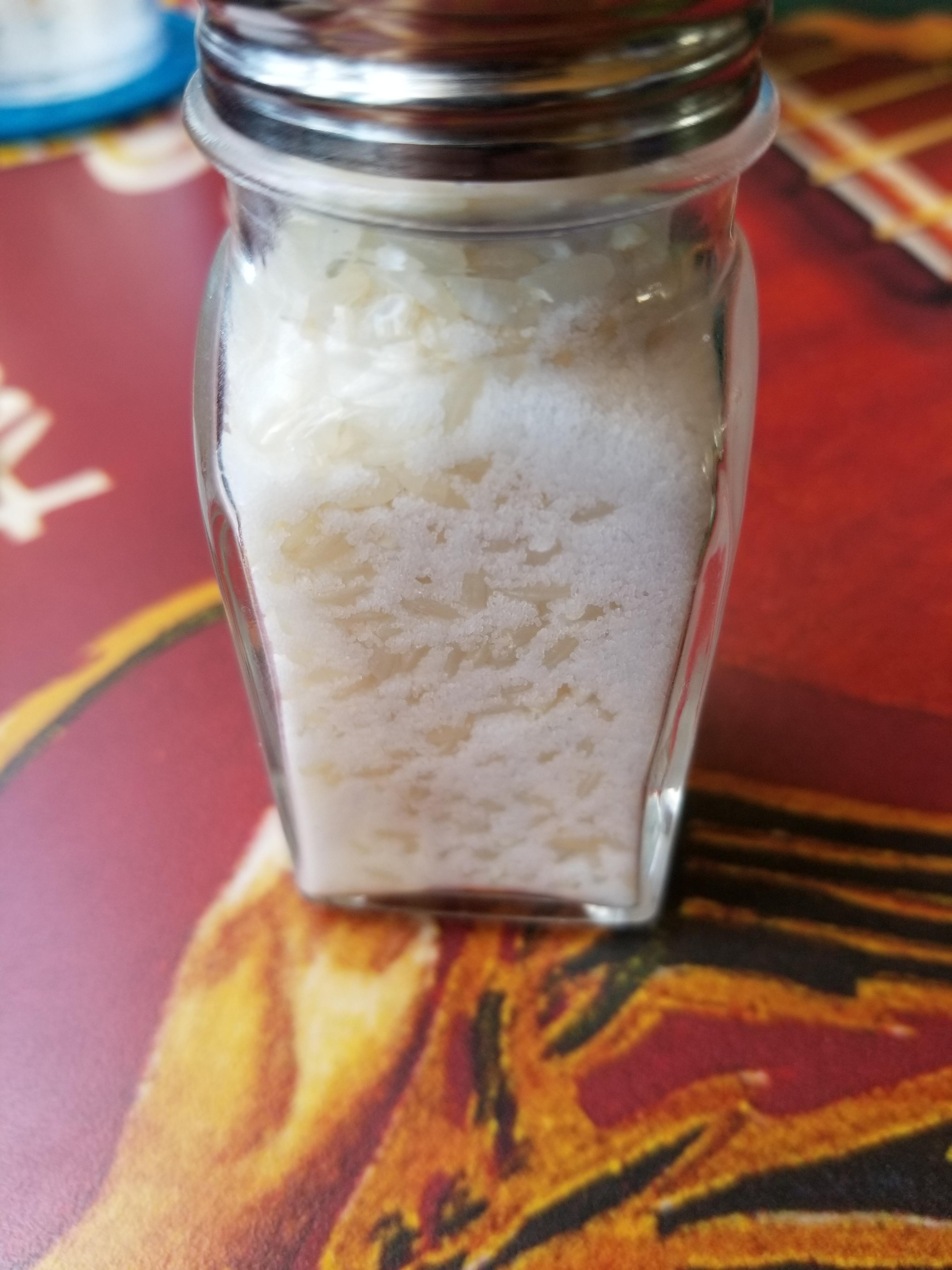 This seaside restaurant puts rice in their salt to prevent it from