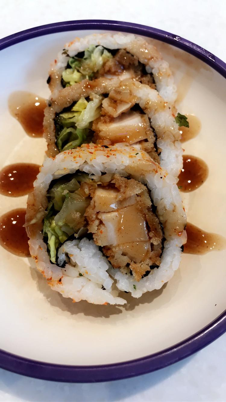 Delicious chicken katsu and lettuce, rolled in shichimi powder & topped
