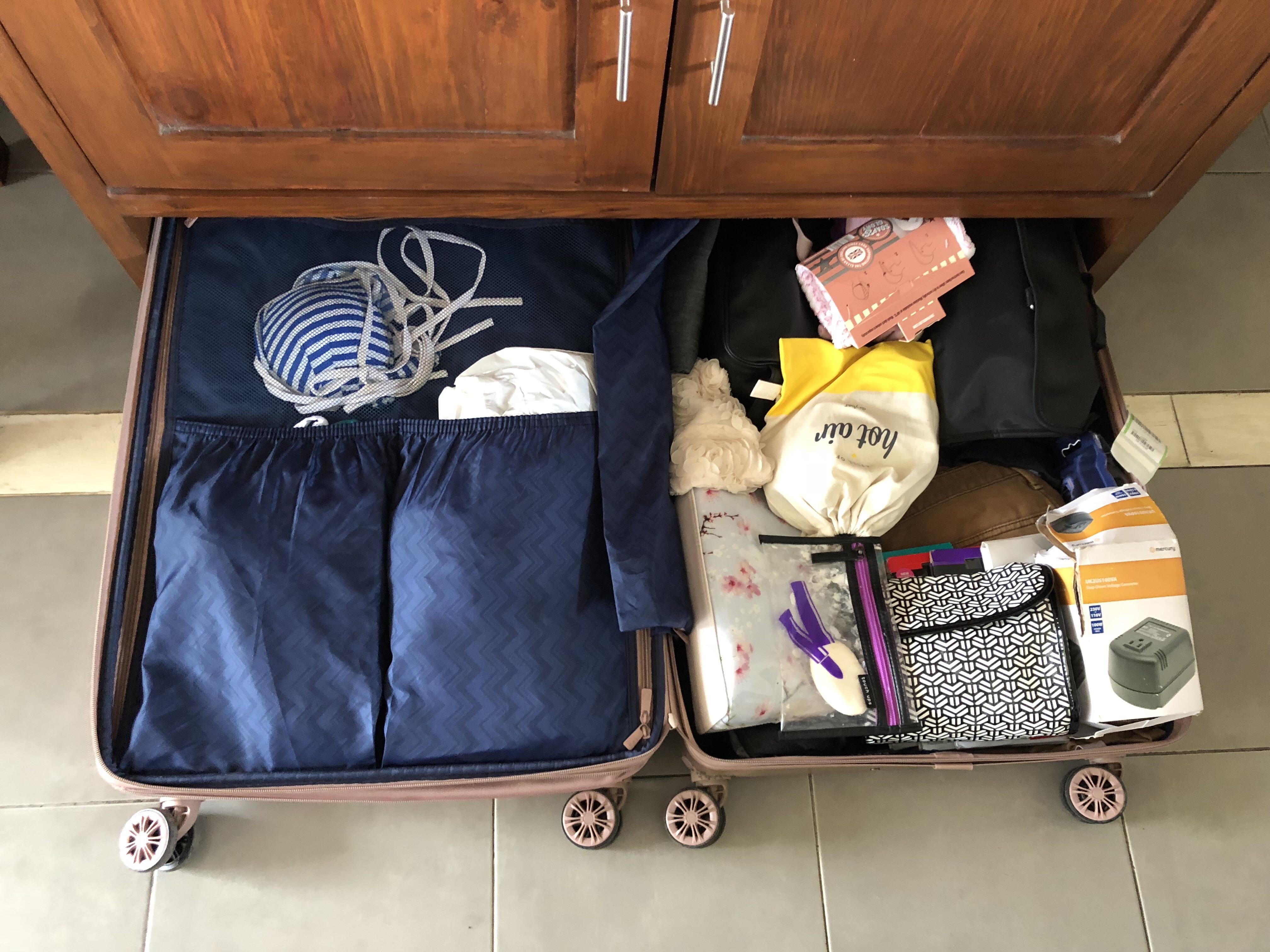 Our suitcase fits perfectly under the dresser in our hotel room. Super