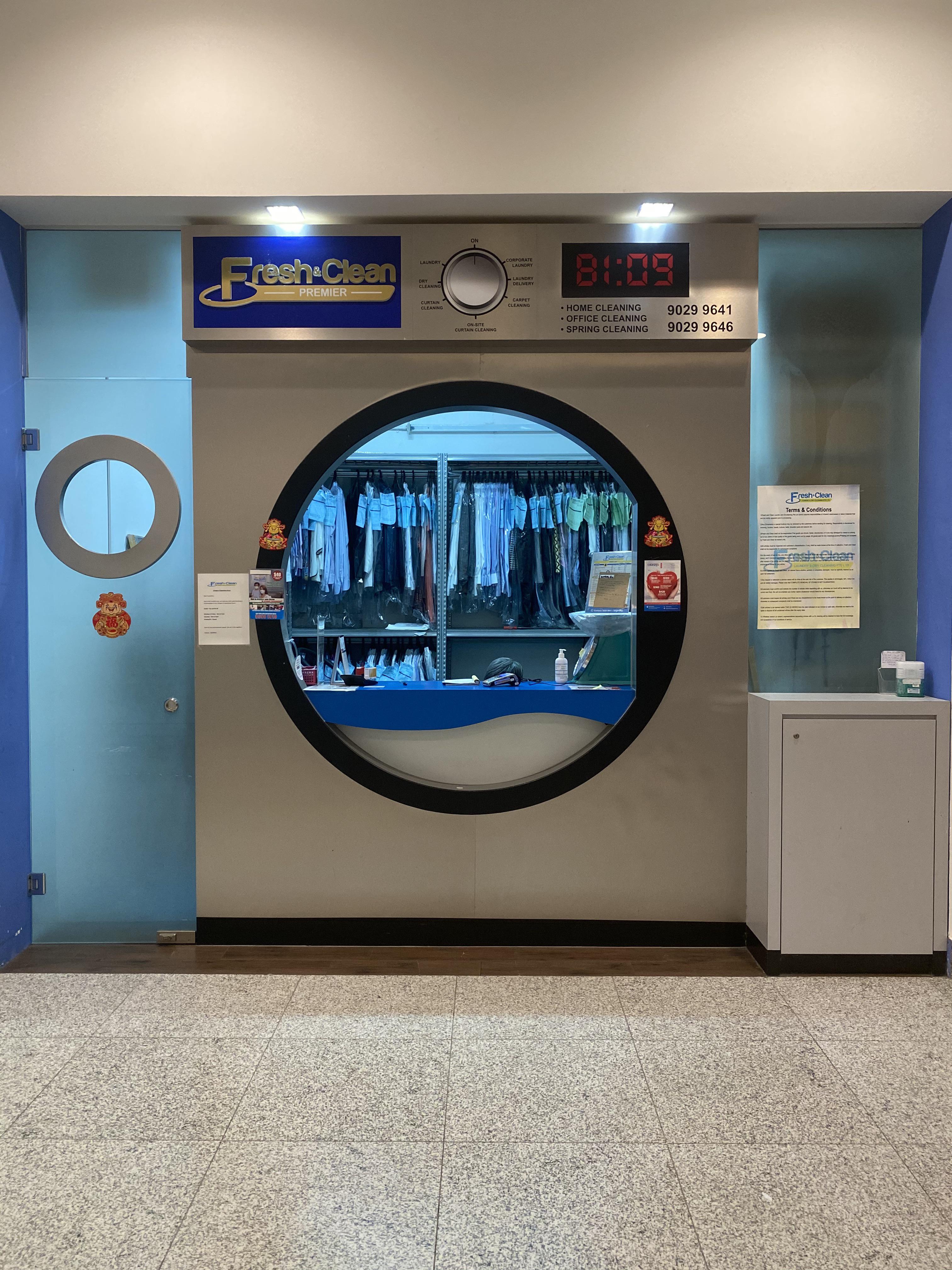 Dry cleaning shop that looks like a giant washing machine in Singapore