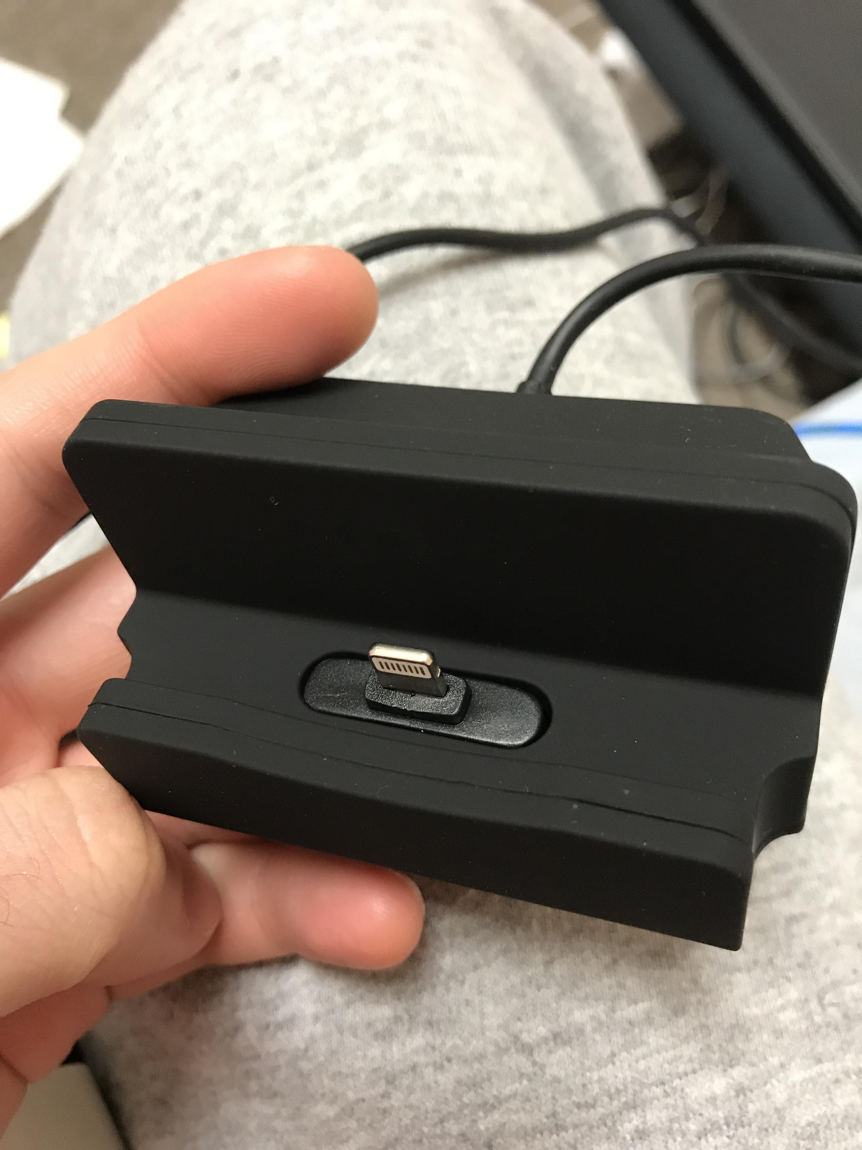 Why does this iPhone docking/charging station smell like burnt matches