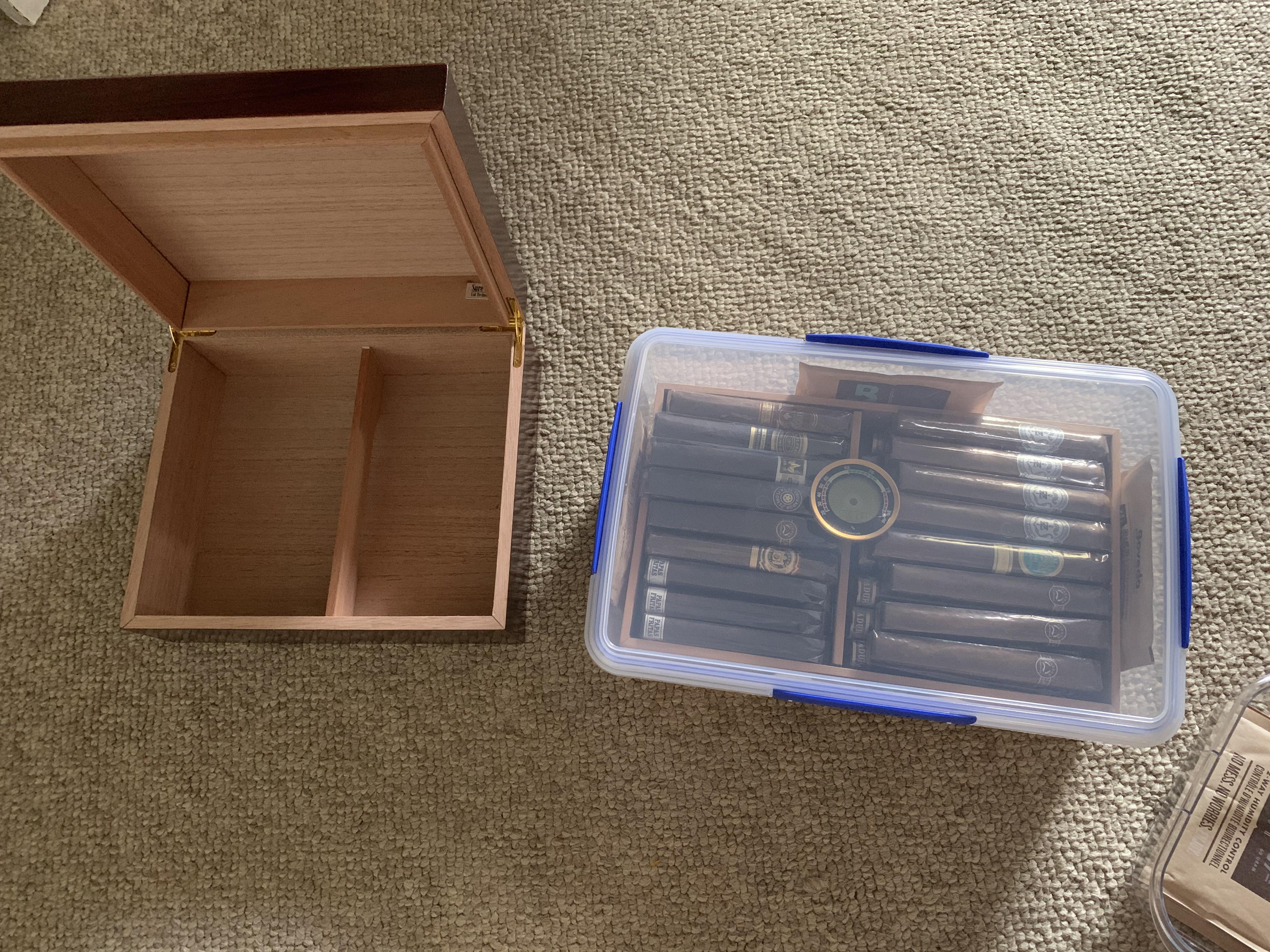 An upgrade from the wood humidor to a Tupperware r/cigars