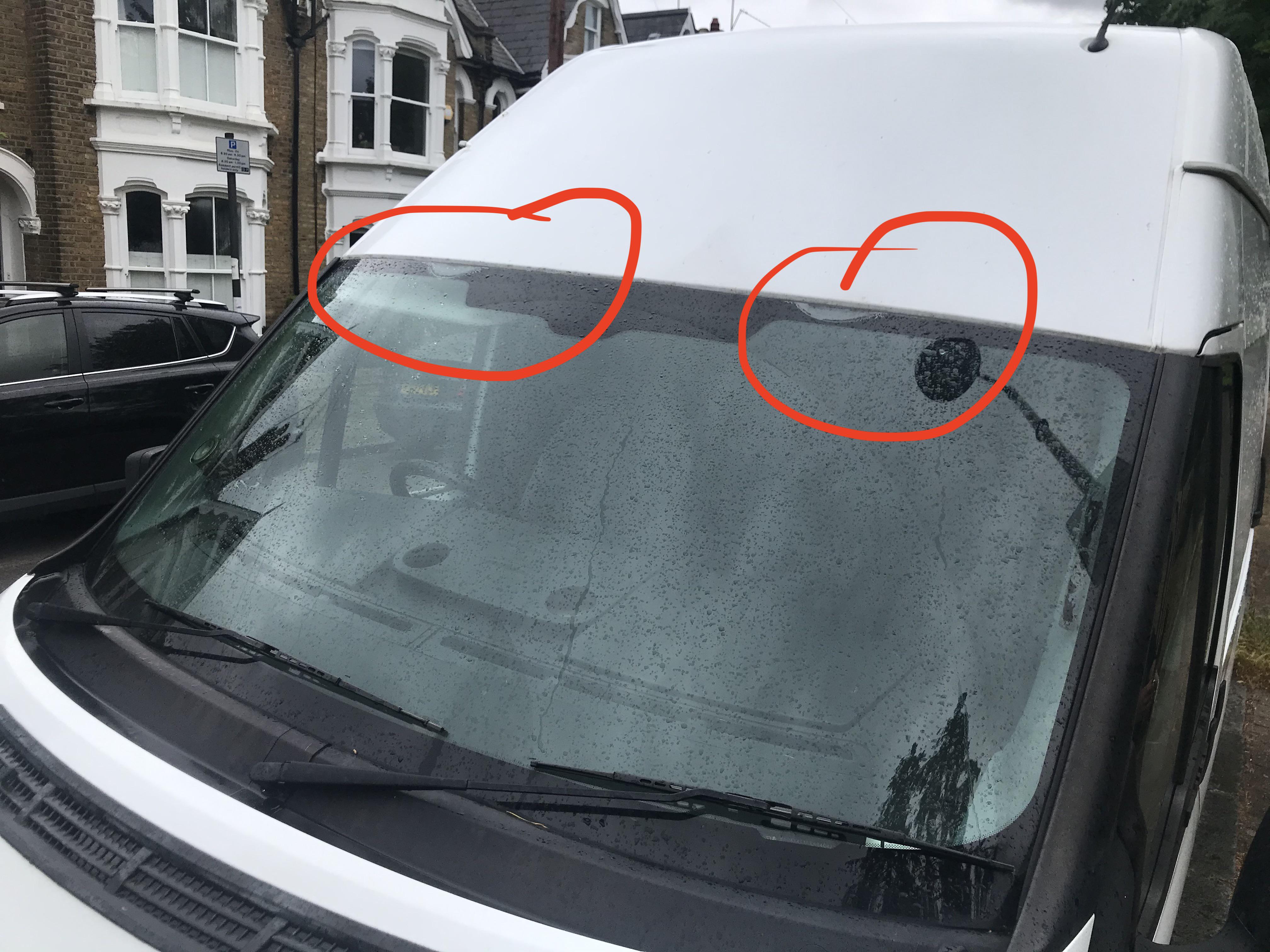 Anyone seen these marks on the windshield of a Ford Transit before ('60