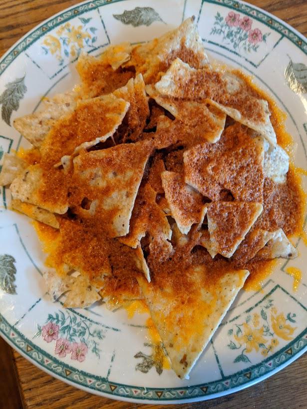 Lightly microwaved tortilla chips with cheese r/shittyfoodporn