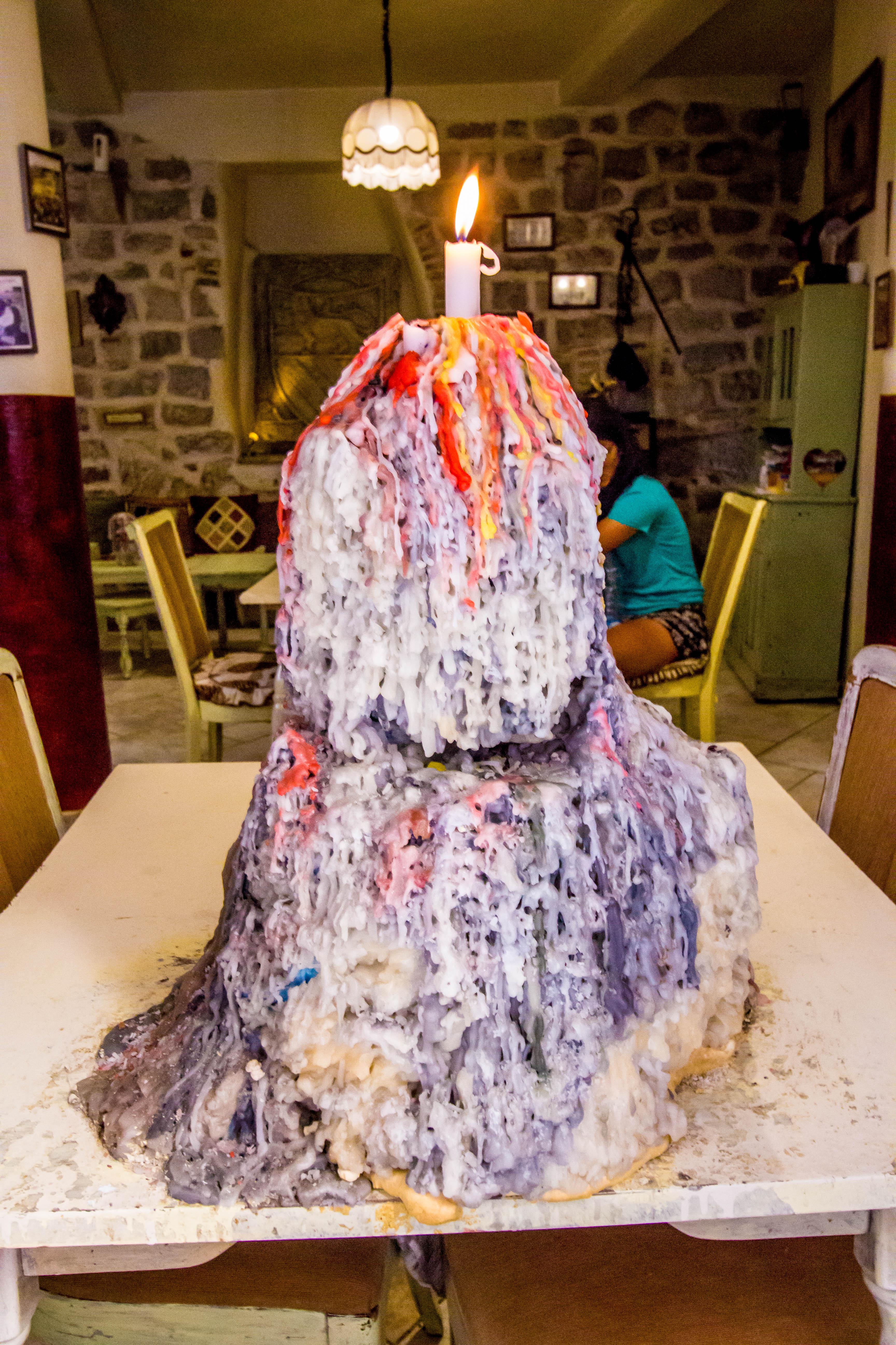 The candle wax is slowly taking over this table r/mildlyinteresting