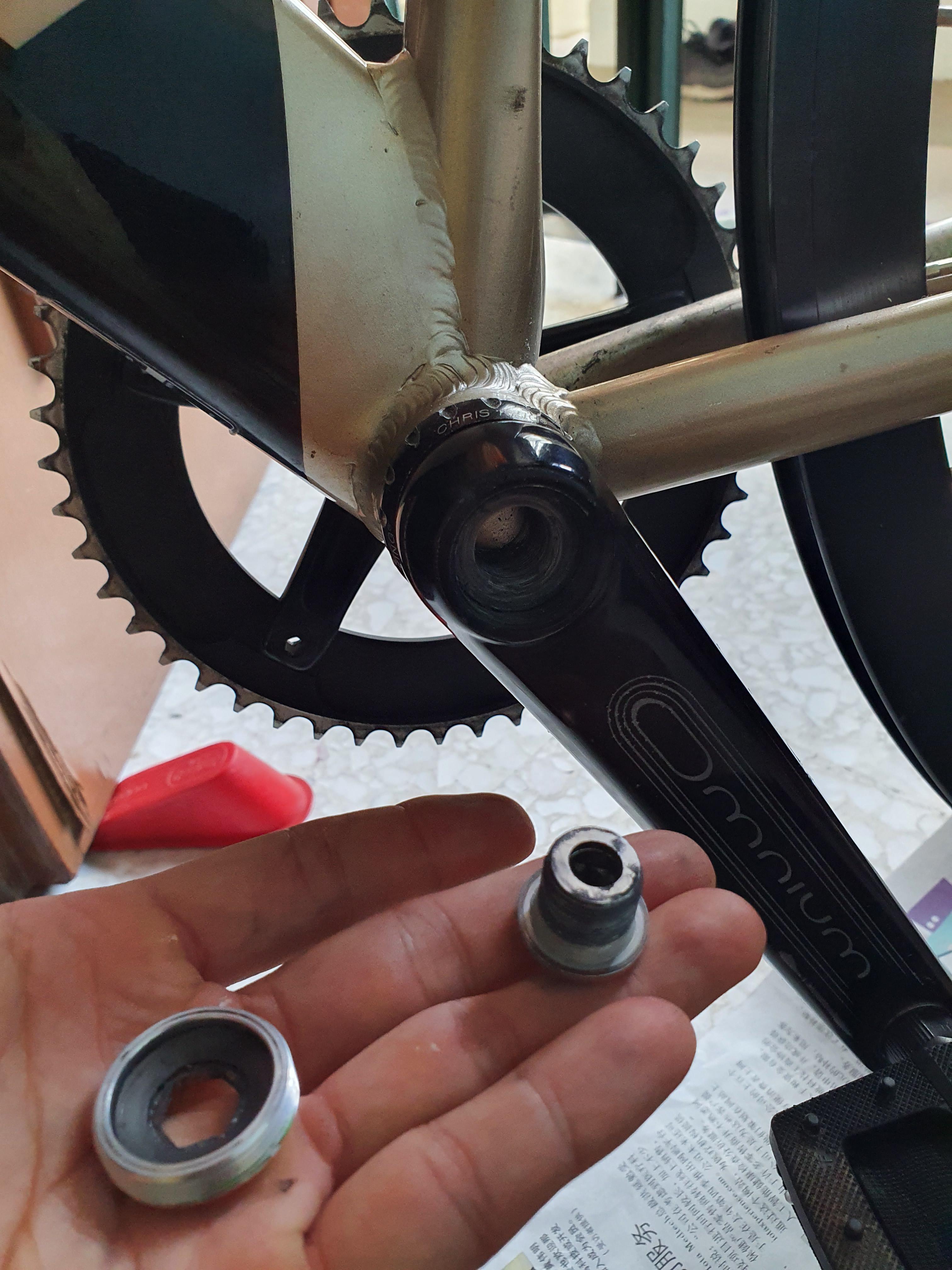 Sram hollowtech track crank is stuck. I have removed the only 2 bolts
