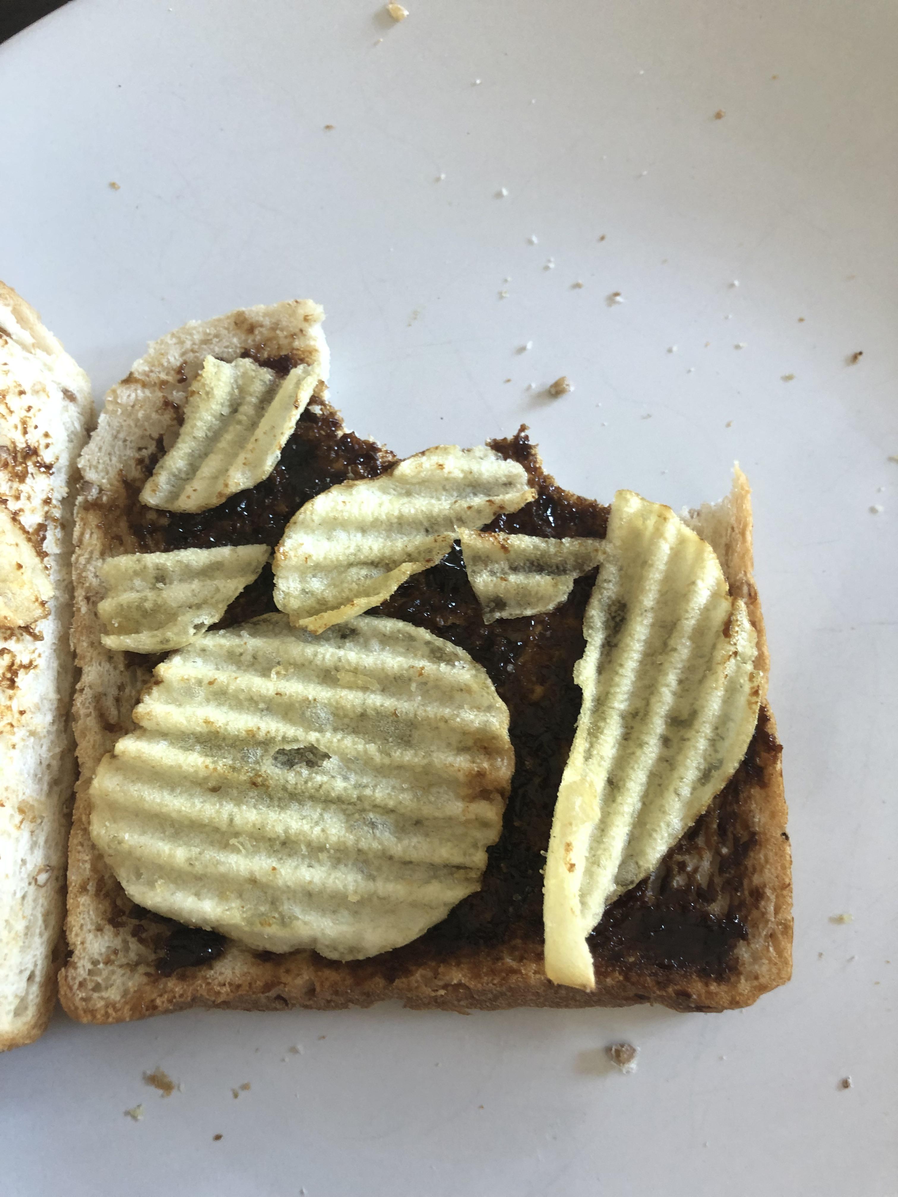 Vegemite and salt and vinegar potato chip sandwich for breakfast, went