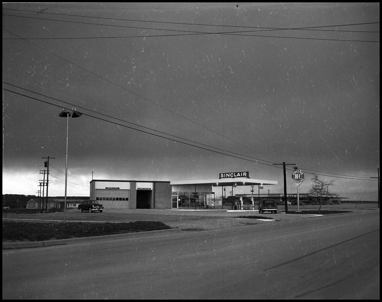 Sinclair Gas Station at Allandale Village w/ storm February 10, 1950
