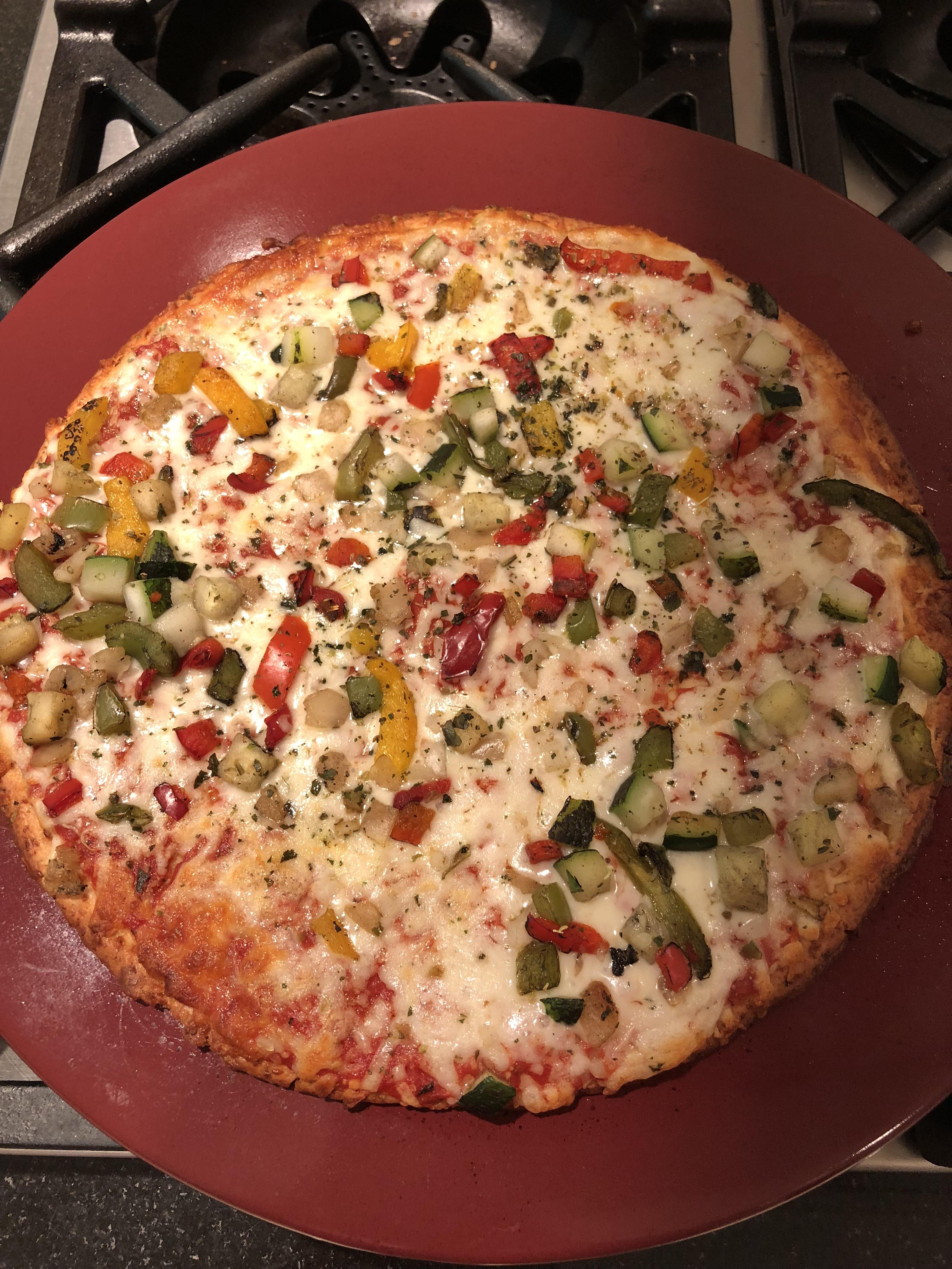 I never thought I’d love cauliflower crust pizza, but this one is great