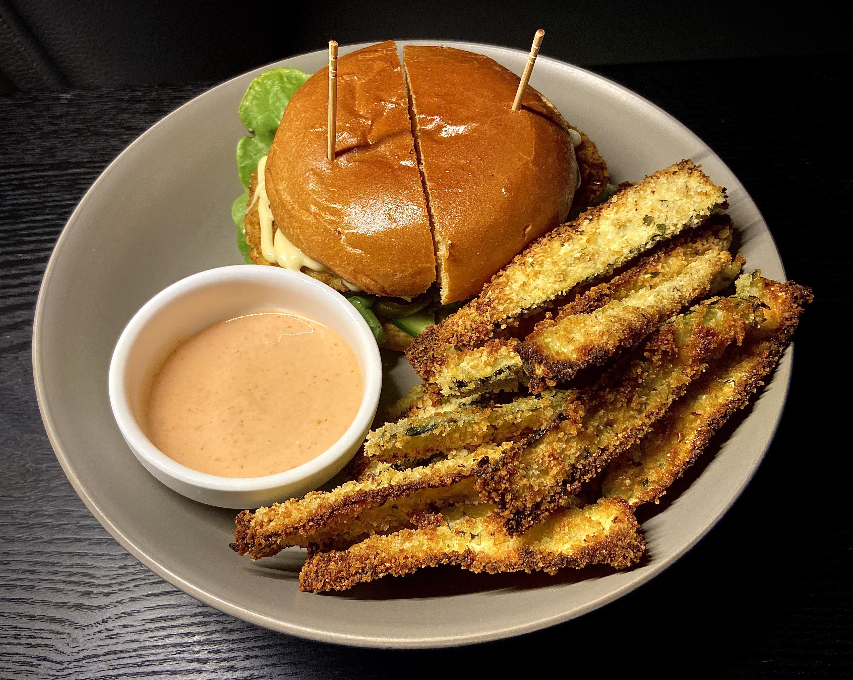 Crunchy chicken burger, zucchini chips, and chili “mayo” (yoghurt