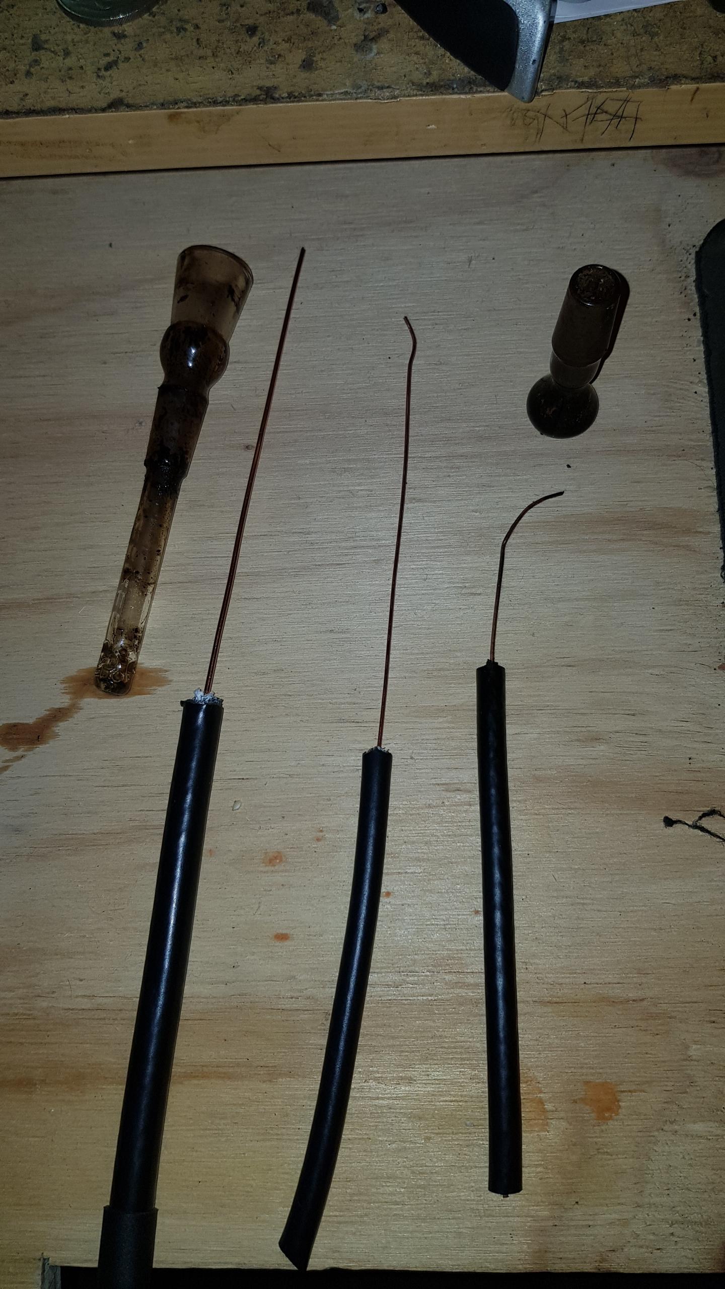 TV Cable (RG6) Makes for a handy poking/clearing tool with a handle