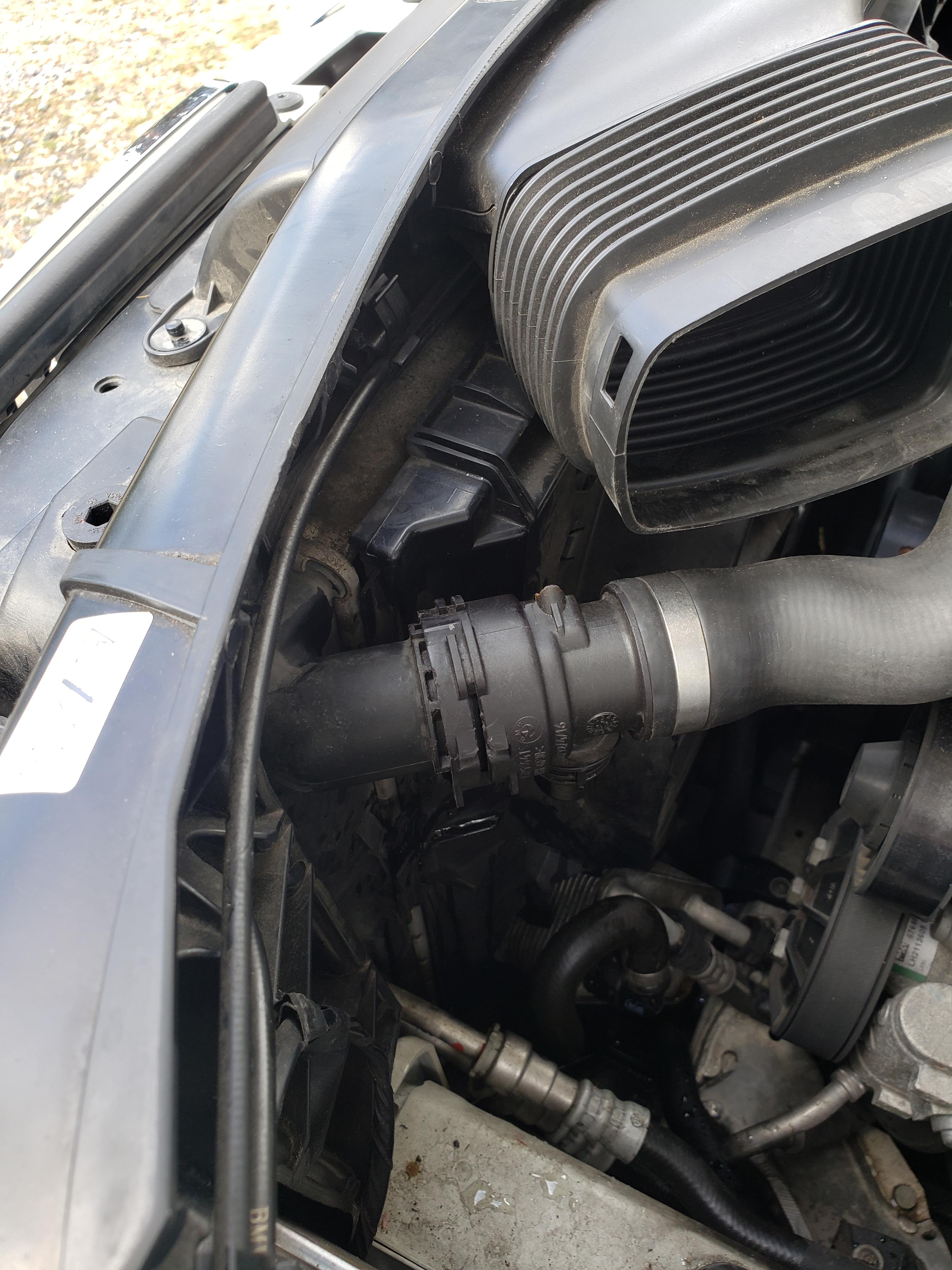 Best way to get upper radiator hose off. It seems to be stuck when I