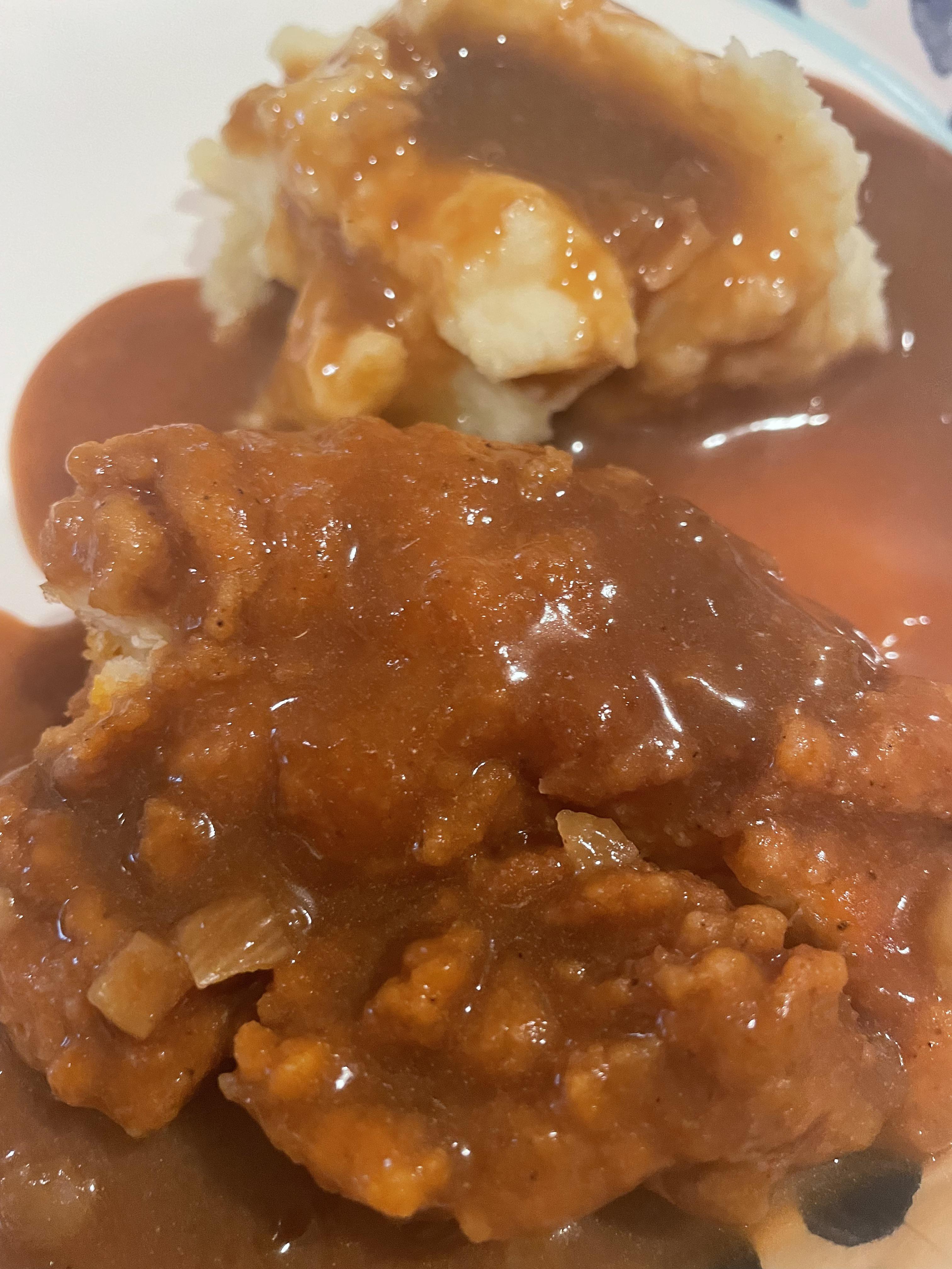 Chicken tenders with brown gravy… a lazy chicken schnitzel. r/shittyfoodporn