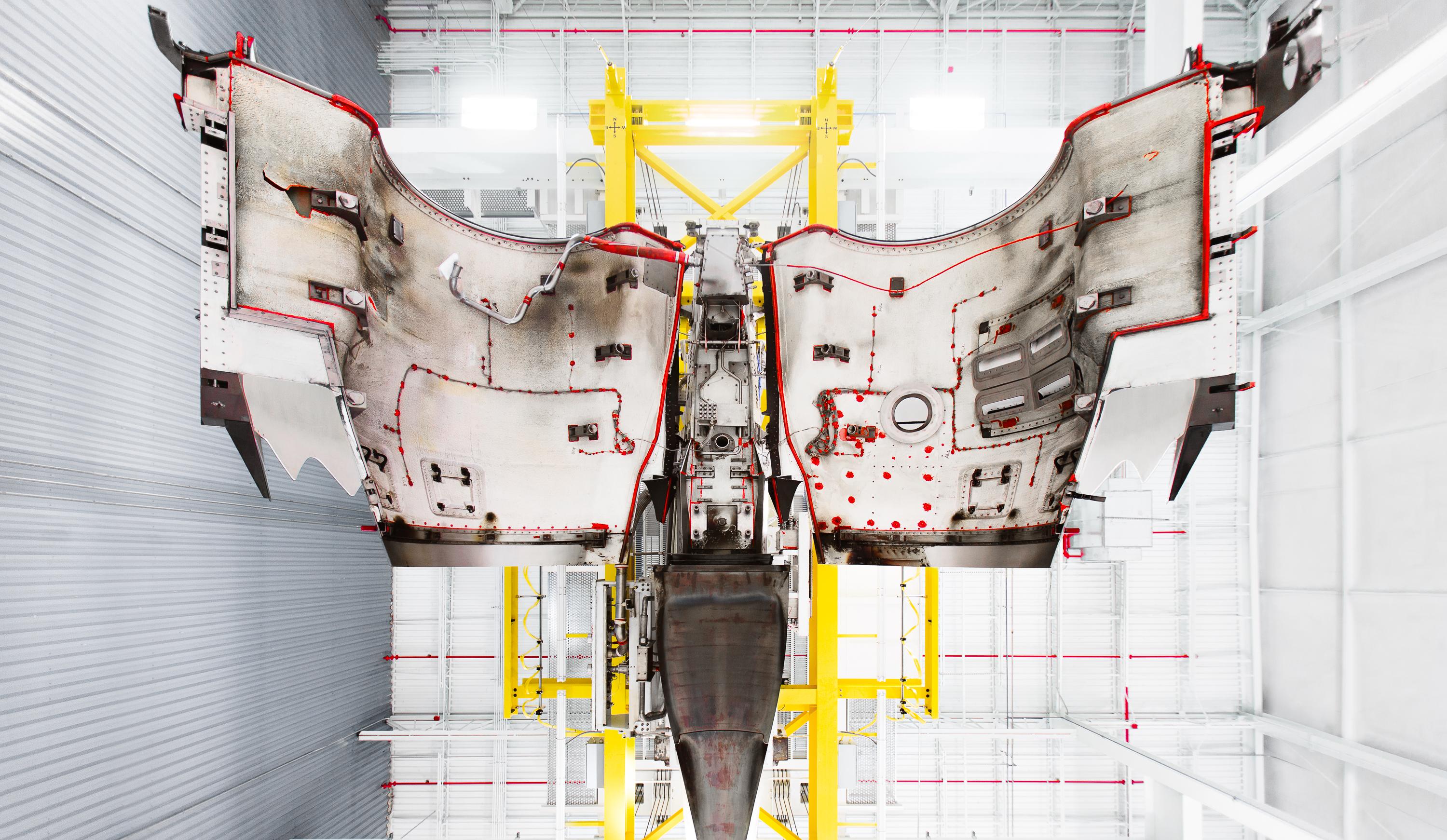 A cowl for a GEnx jet engine stretched out. These cowls help with the