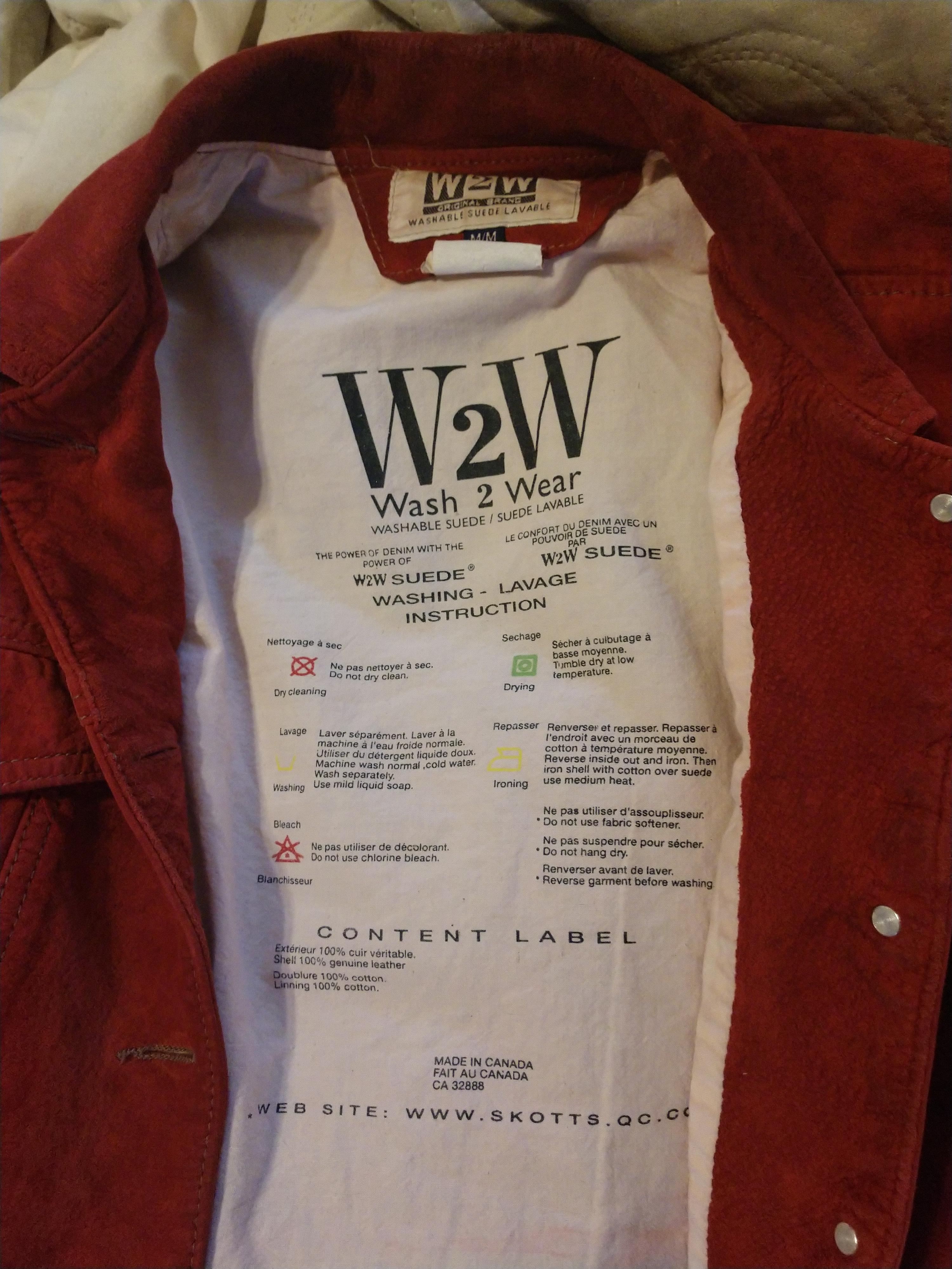 This suede jacket has washing instructions printed onto the back of it