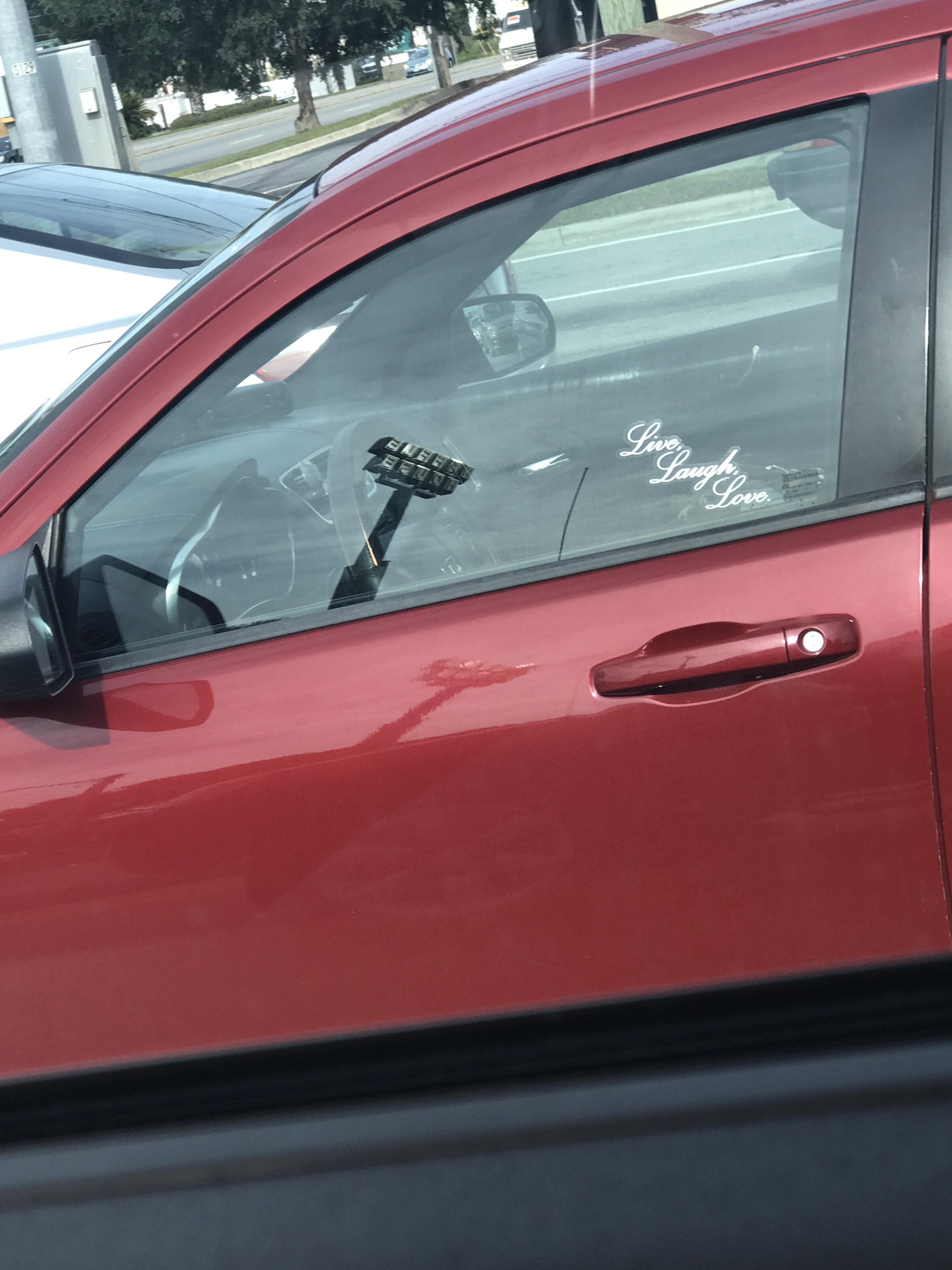 I've never seen one of those tacky stickers on a vehicle before r/Shitty_Car_Mods