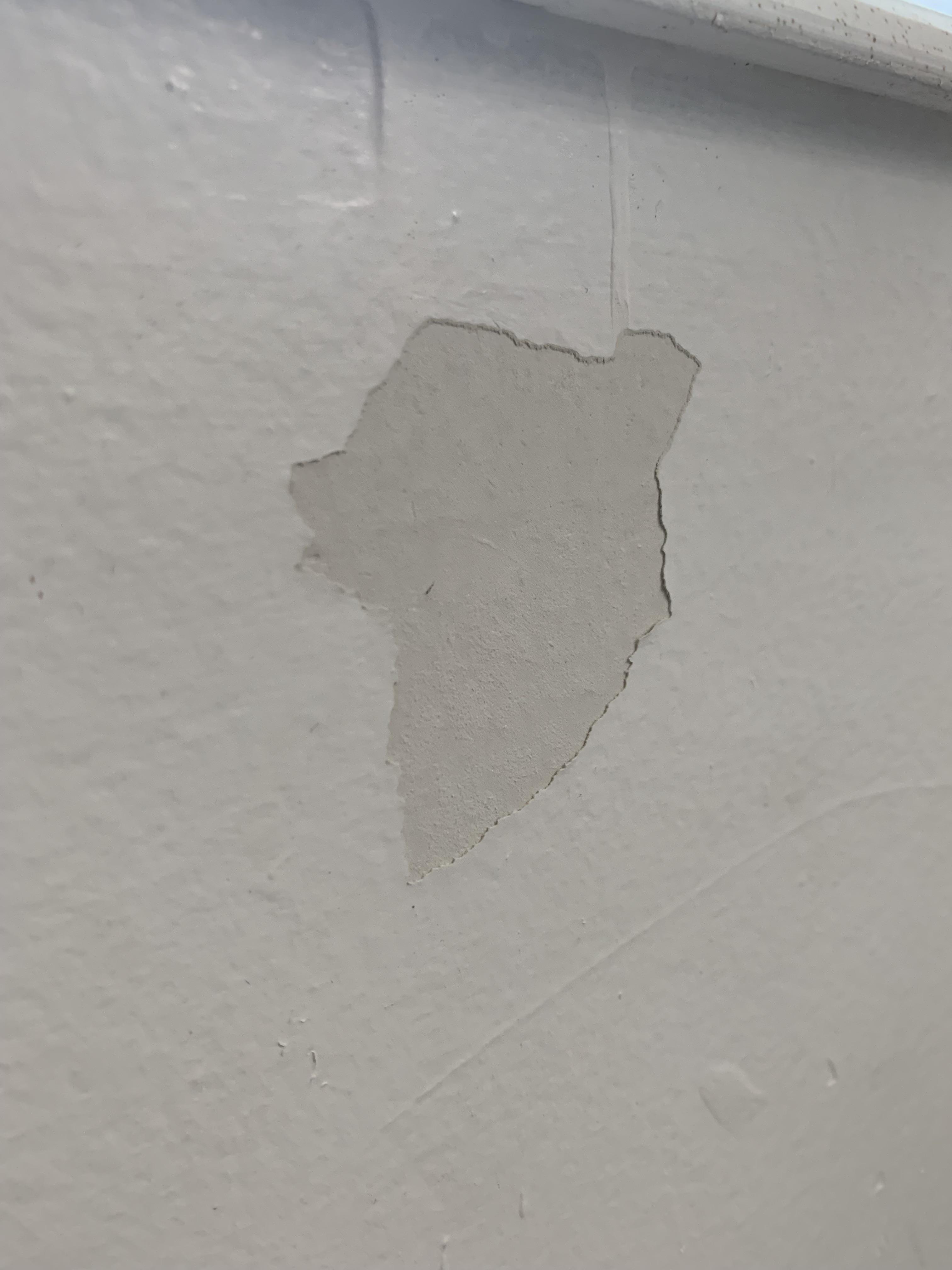 Recently bought house.. Half bath paint peeling. Texture under paint is