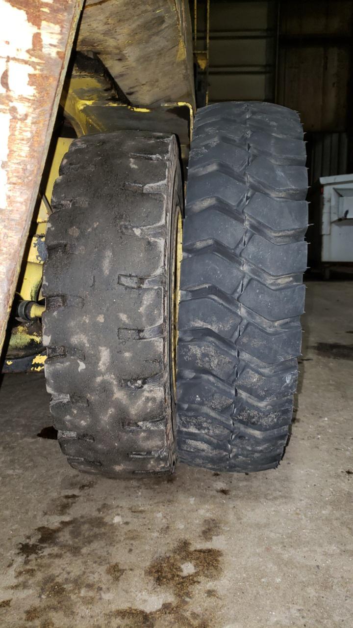 My old forklift's original steer tire vs new. Yes, they're the same