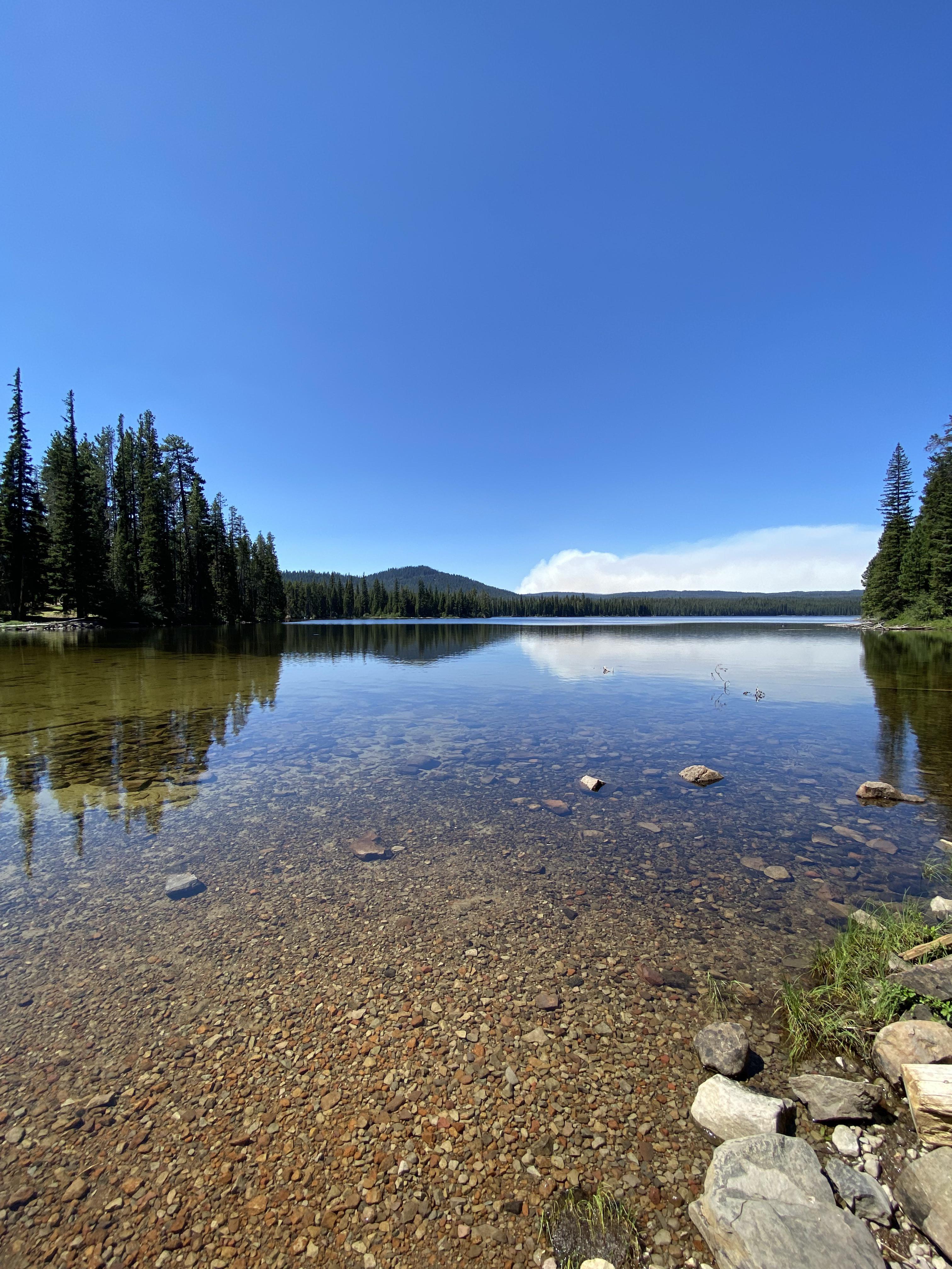 Little Cultus Lake Cedar Creek Fire smoke in the background. r/Bend