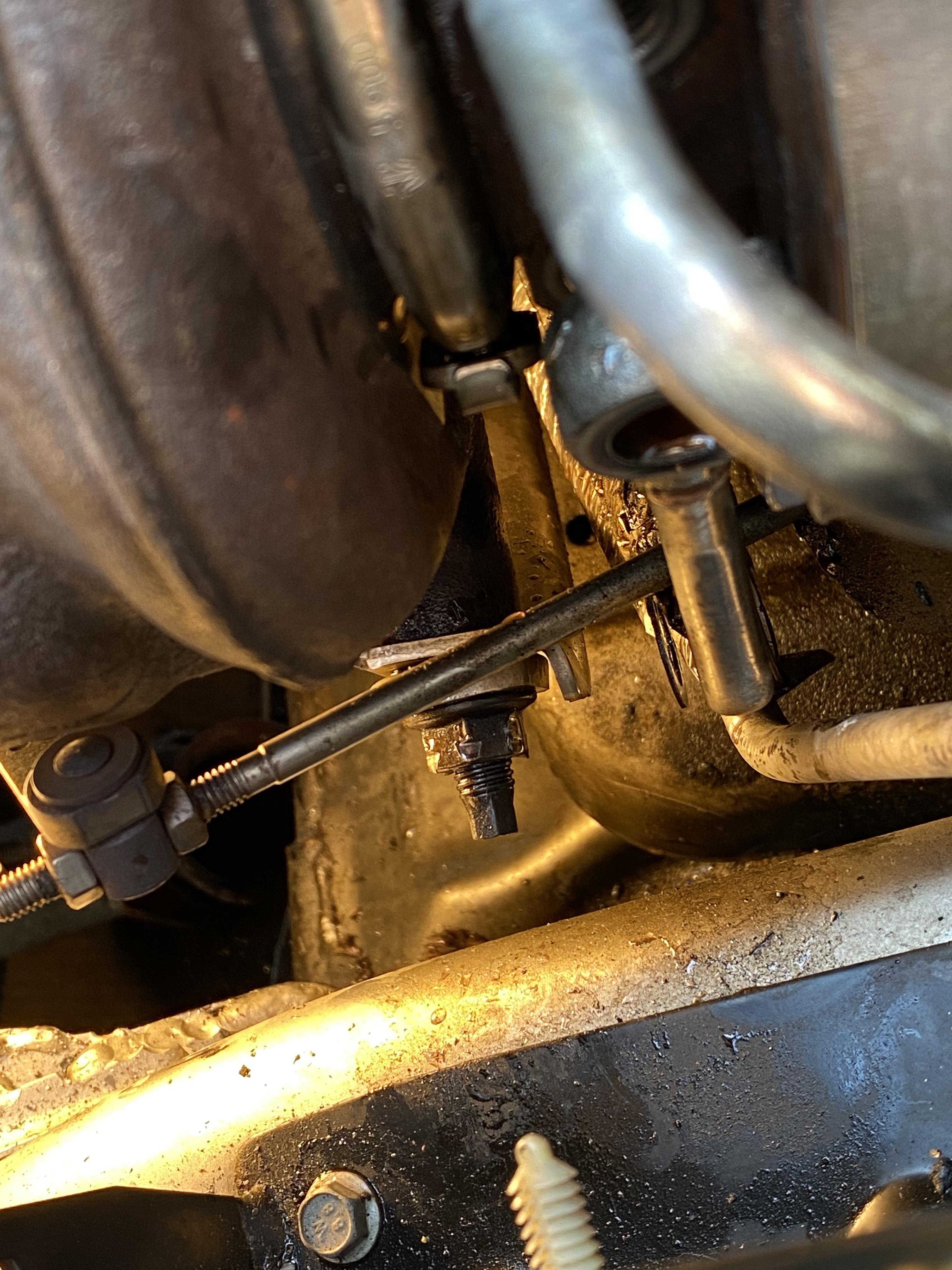 Stripped nut. How can I get this off without further damage? : r