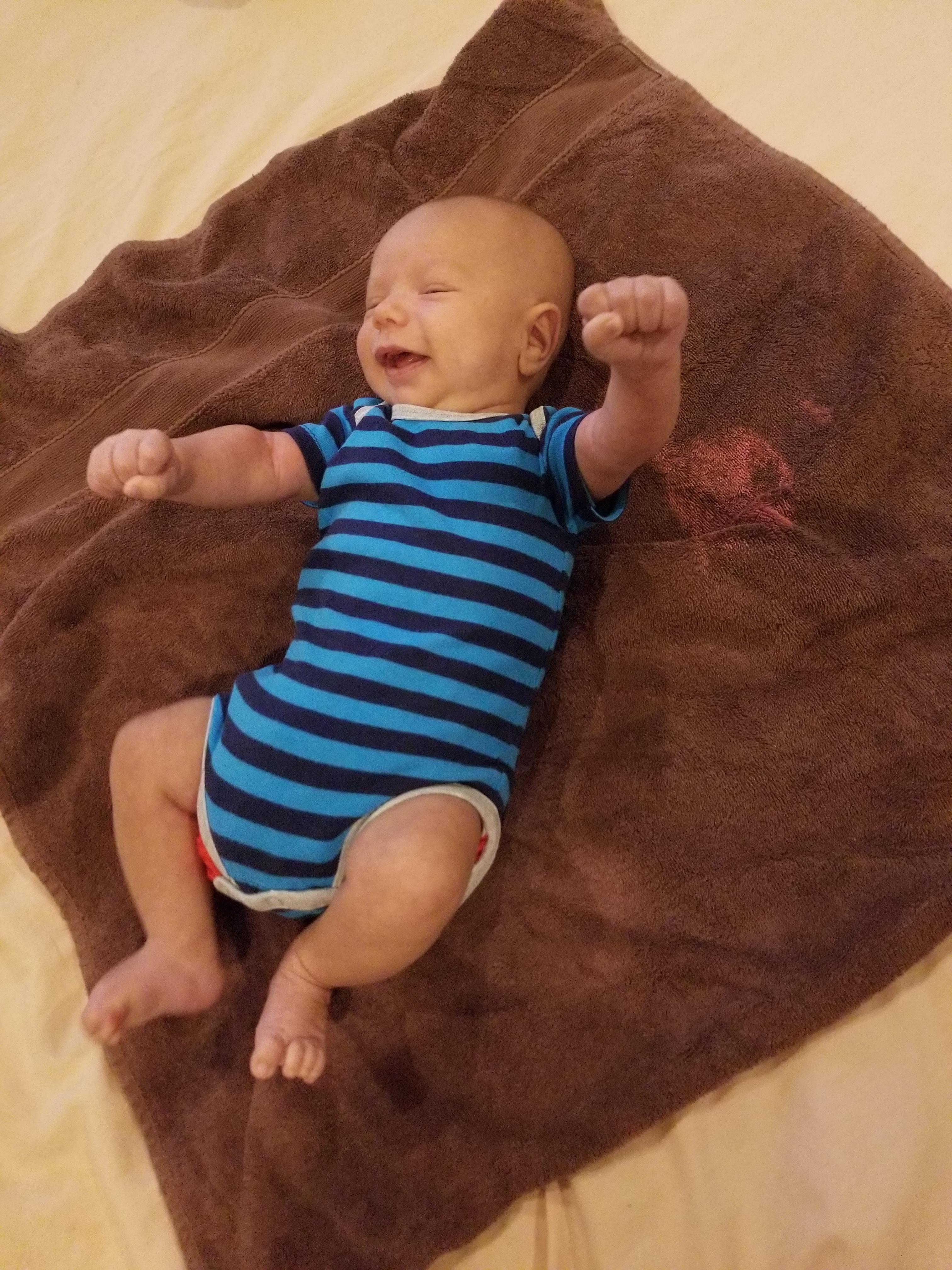 My 8 week old baby wakes up screaming and crying a couple of times a