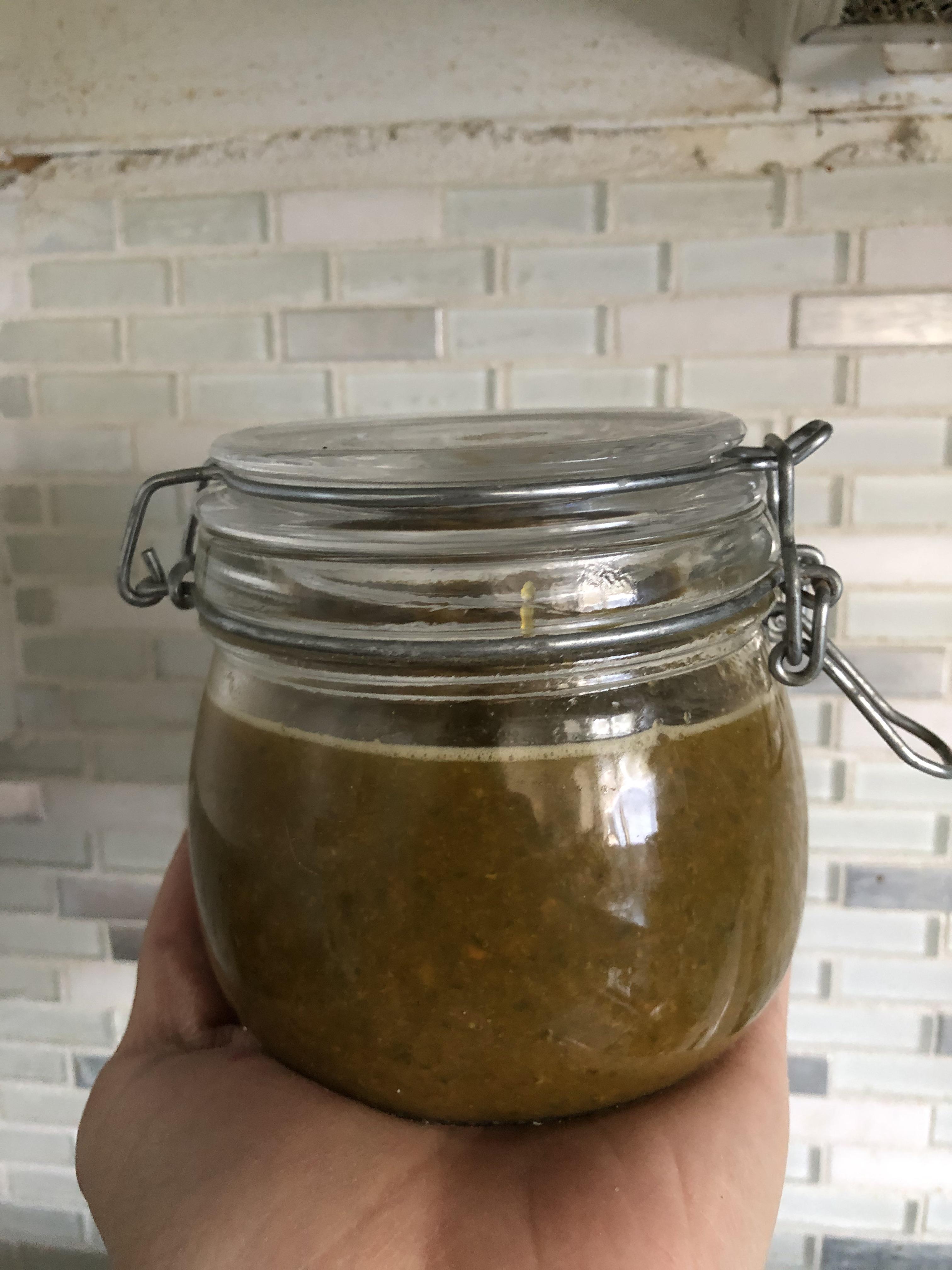 My first fermented hot sauce jalapeños, carrots, onion, garlic and cilantro, went about a week