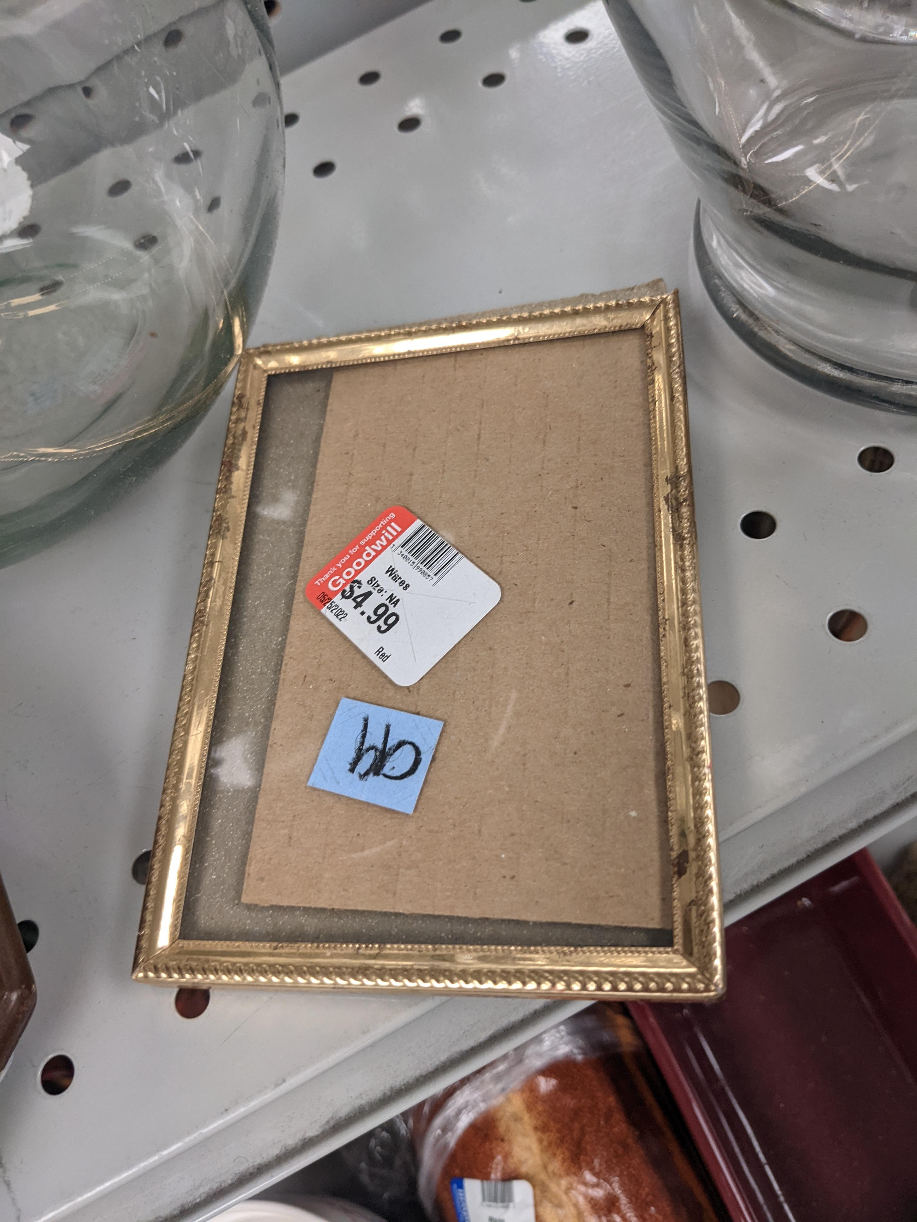 Small gold 4x5 picture frame that was 99 cents at southern thrift... 4