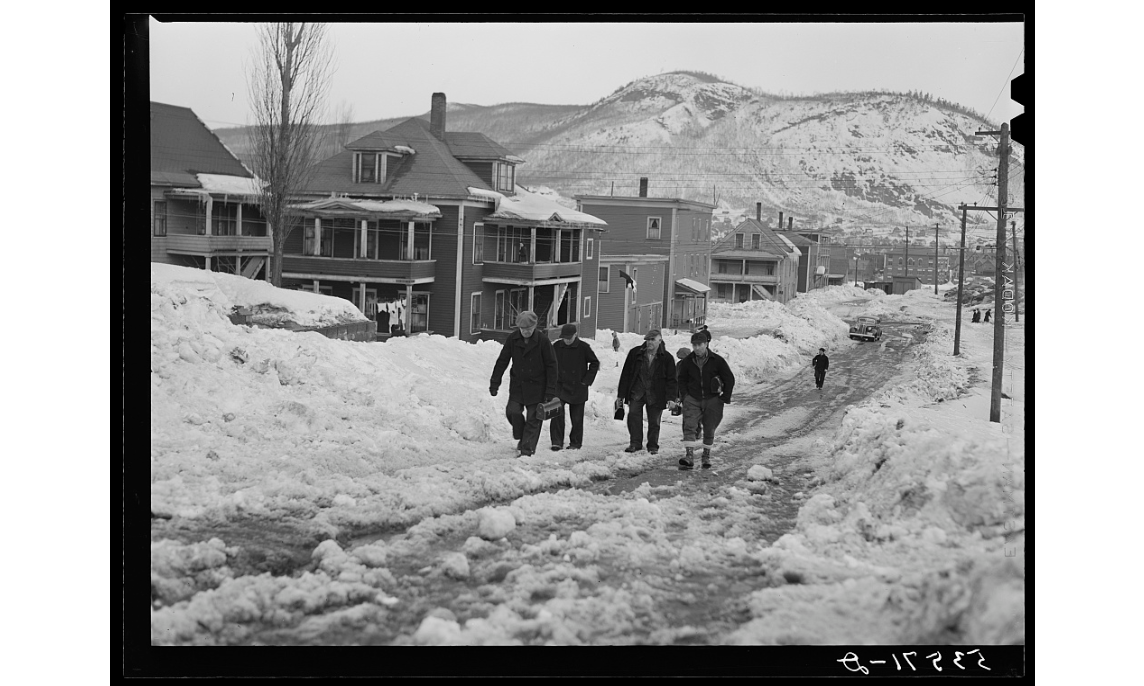 Paper mill workers coming home after work. Berlin, New Hampshire (1940