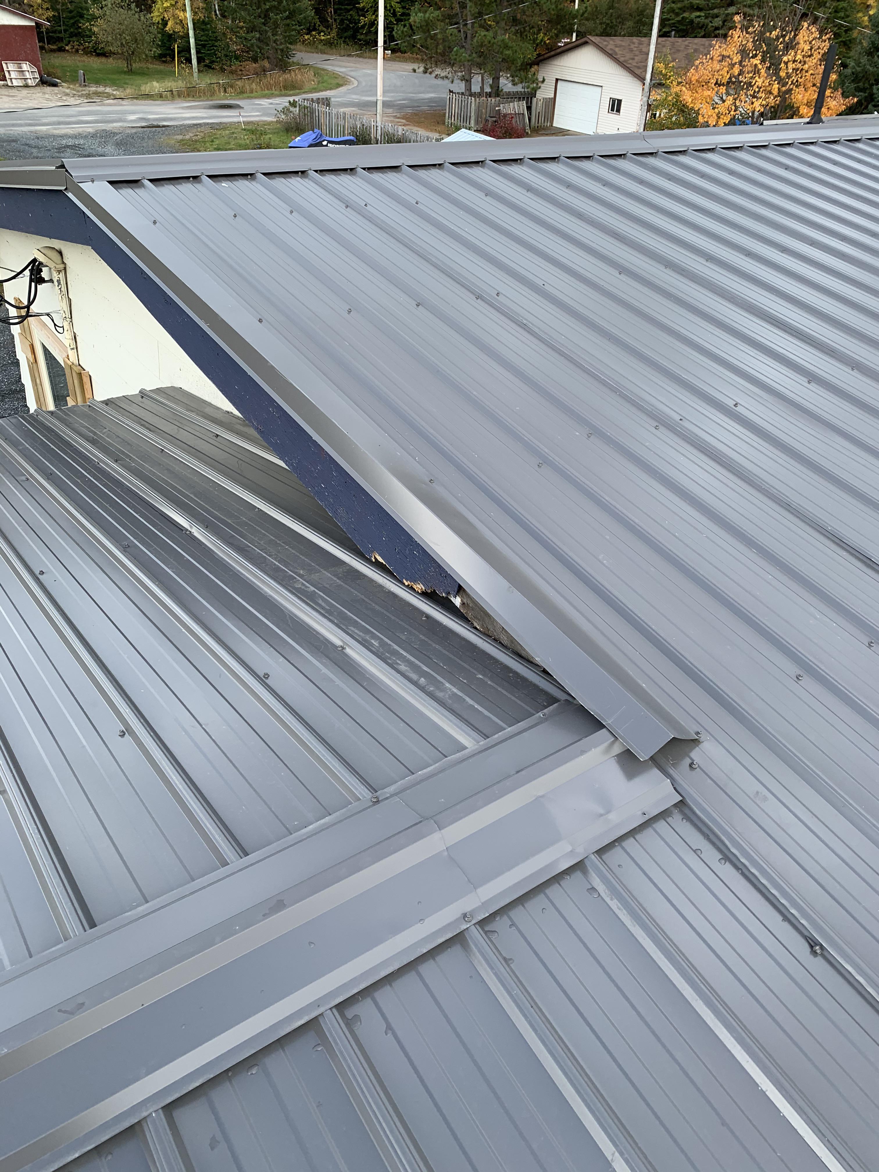 Need help! I have a roof peak that buts up against a gable end? Help