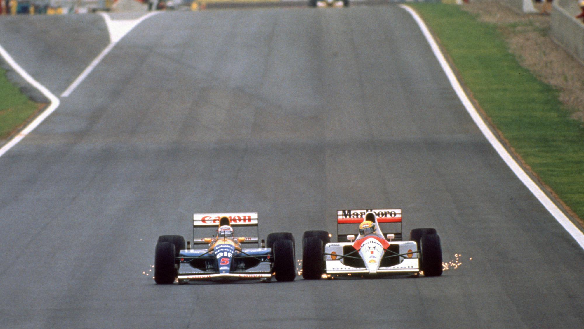 Mansell in his Williams FW14 and Senna in his McLaren MP4/6 wheel to