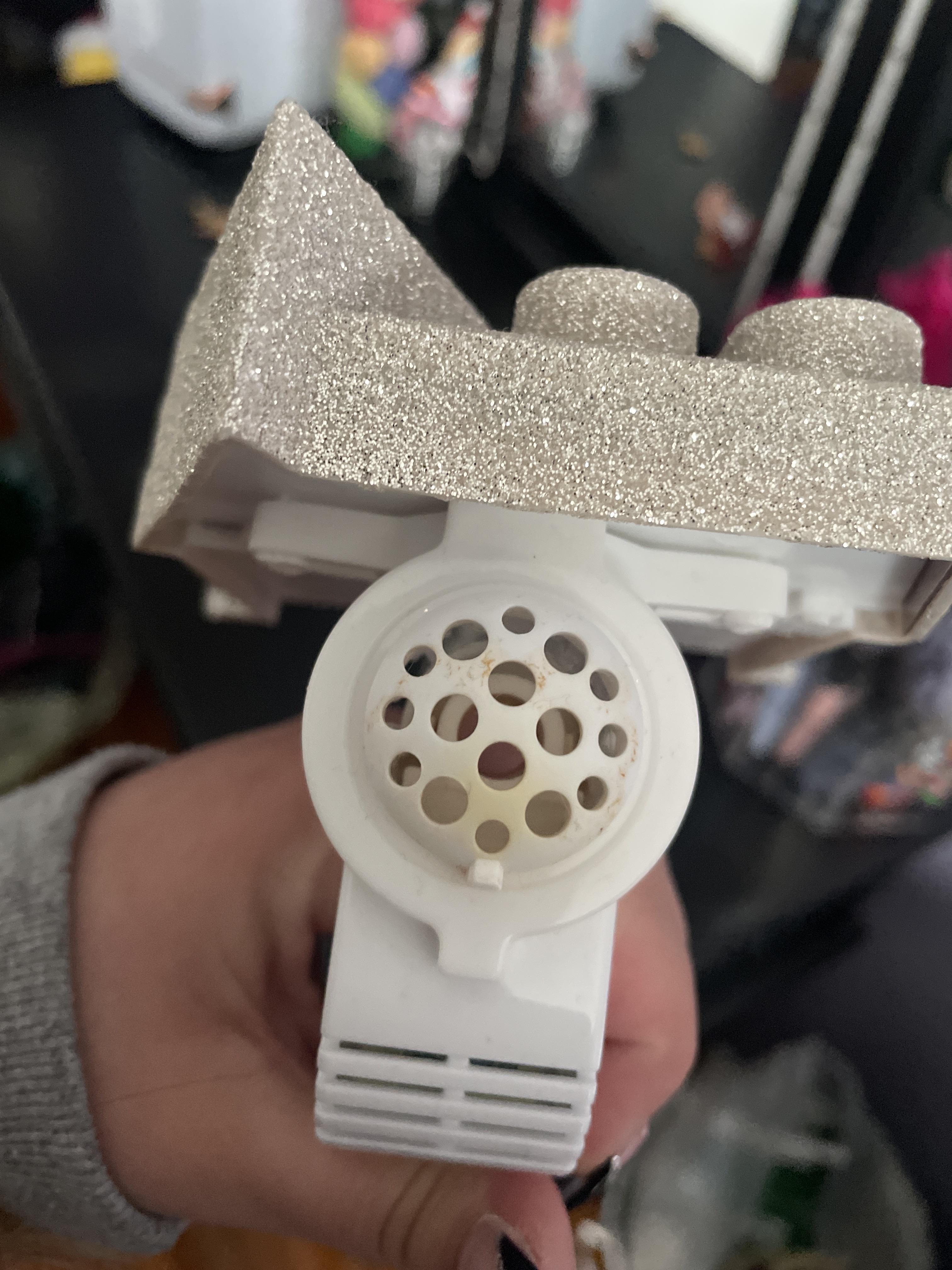 How do you guys clean the top of your wallflower plugs?? bathandbodyworks