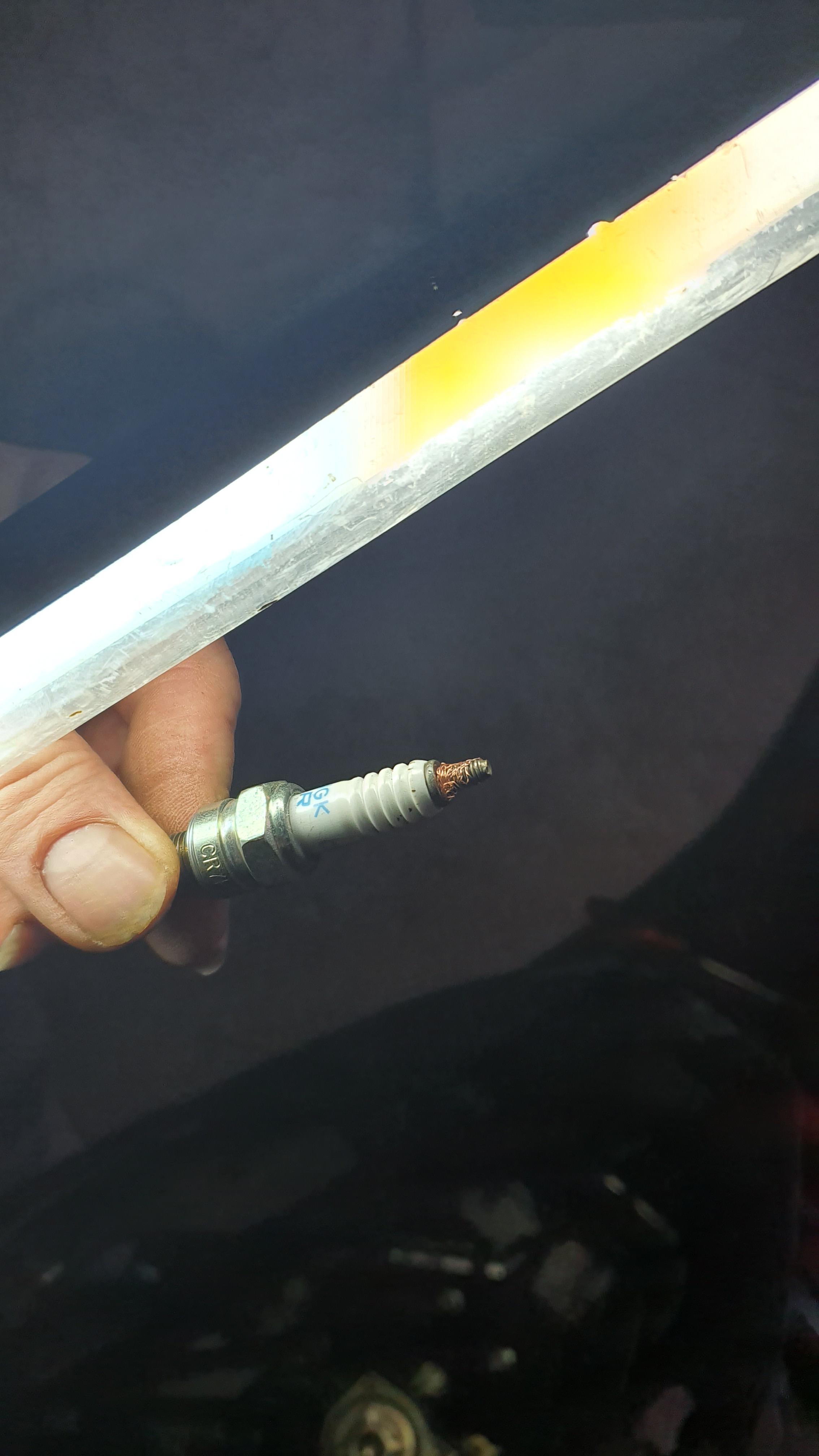 Spark plug doesn't connect? Use copper wire to fix it : r