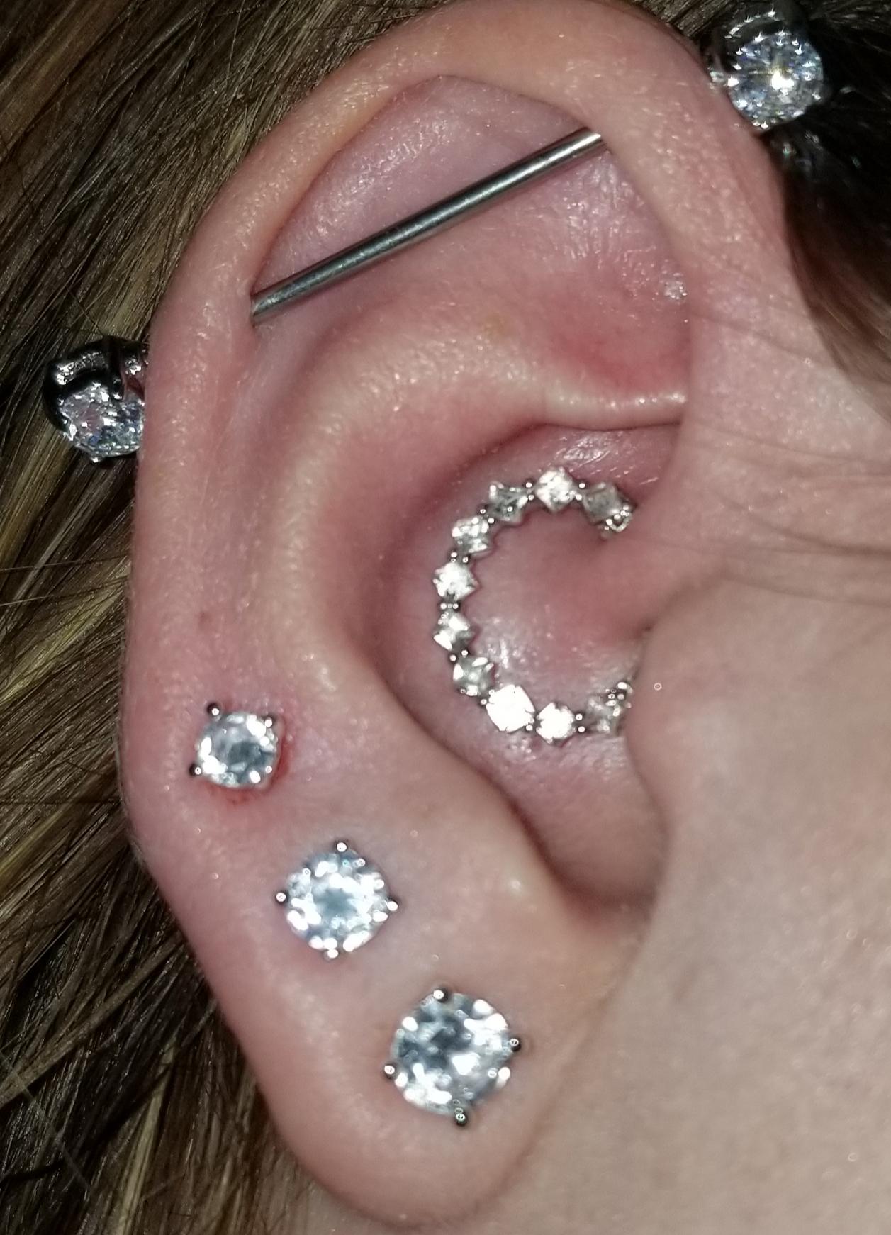 I took all my piercings out but a single lobe over a year ago. Recently