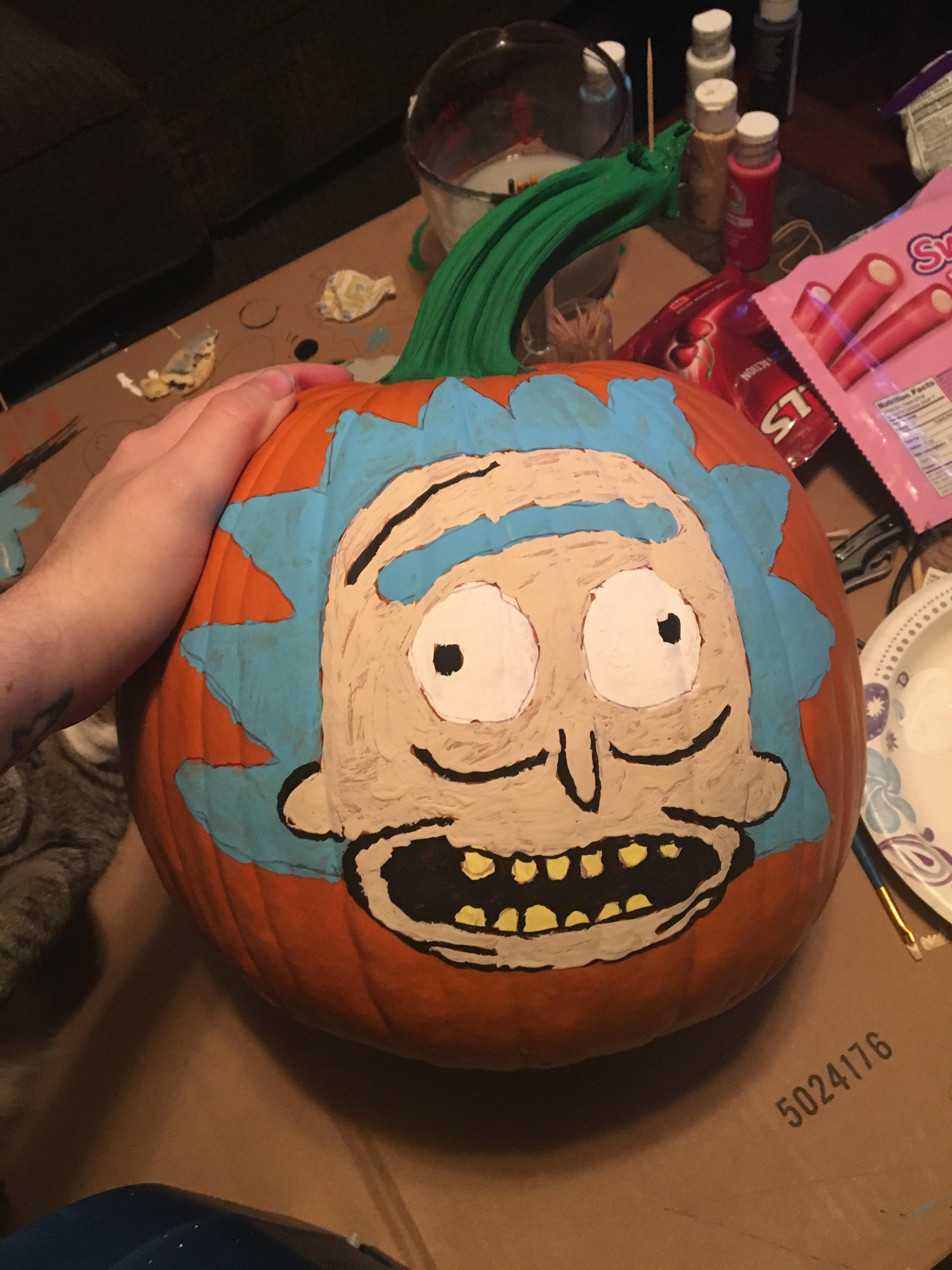 My 14yo brother painted Rick on a pumpkin. He loves Rick and Morty, I'm