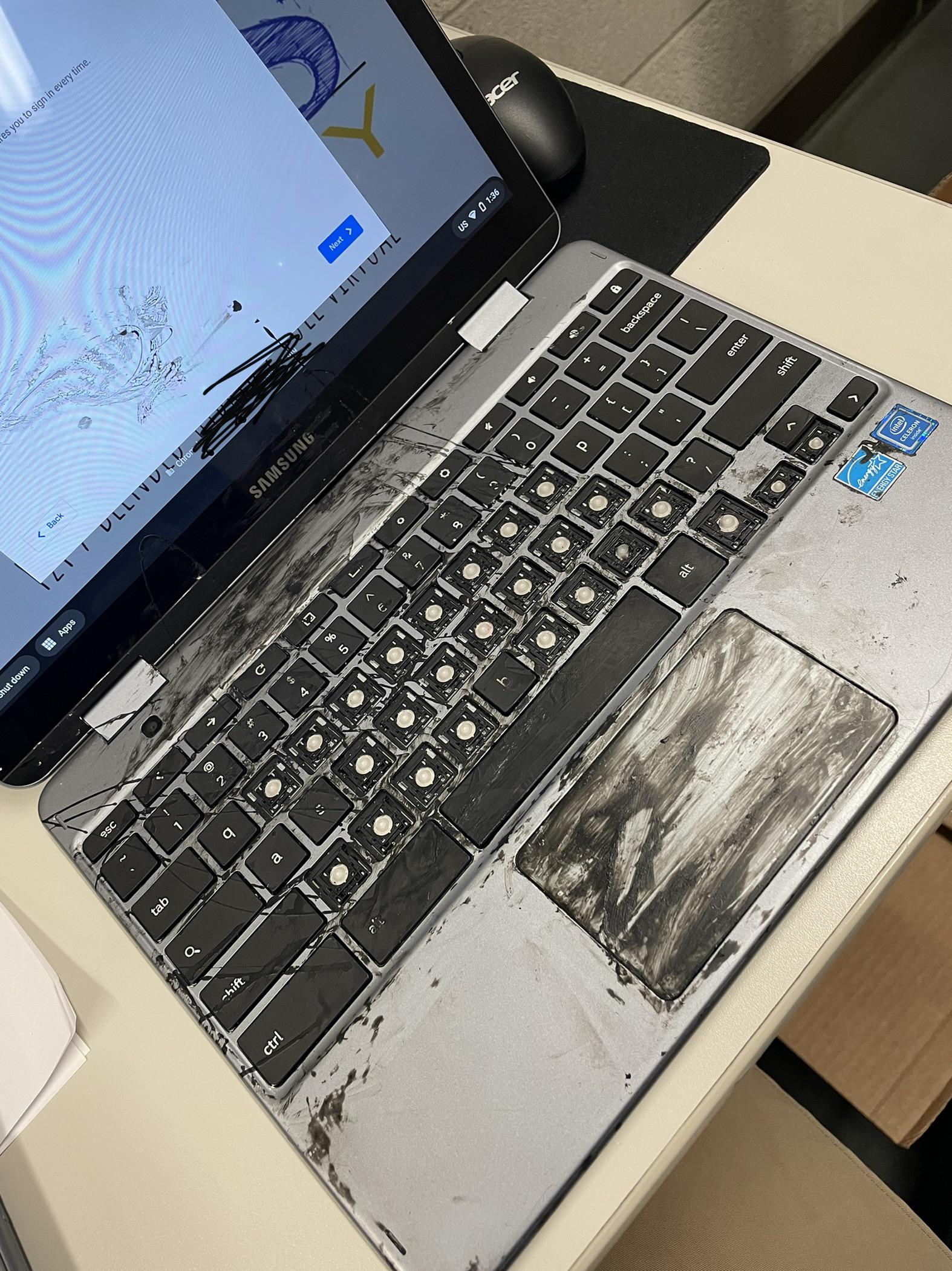 Student spilled nail polish on computer. Mother tried to clean it and
