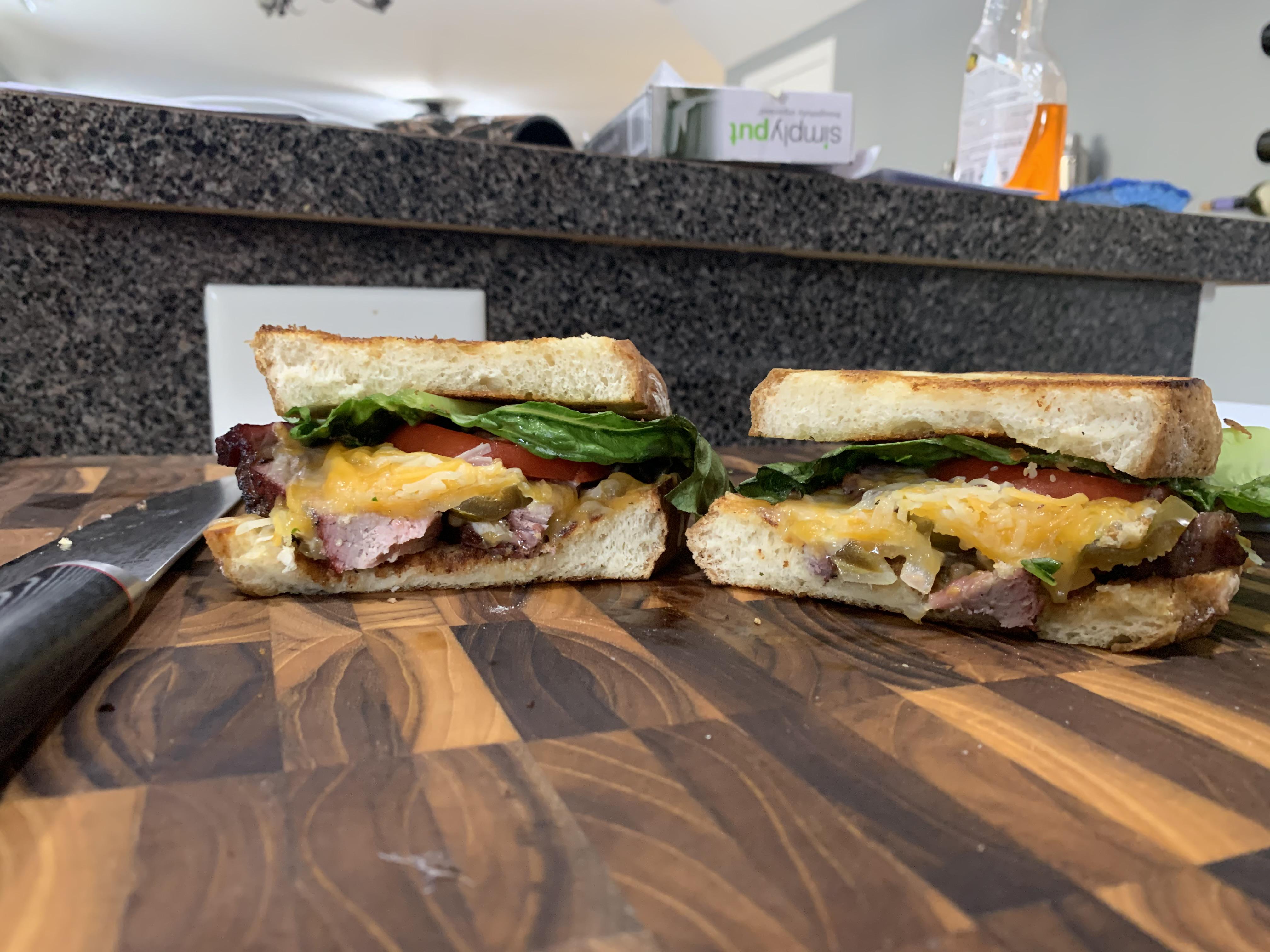 Reverse seared ribeye steak sandwich on garlic thyme sourdough. Not