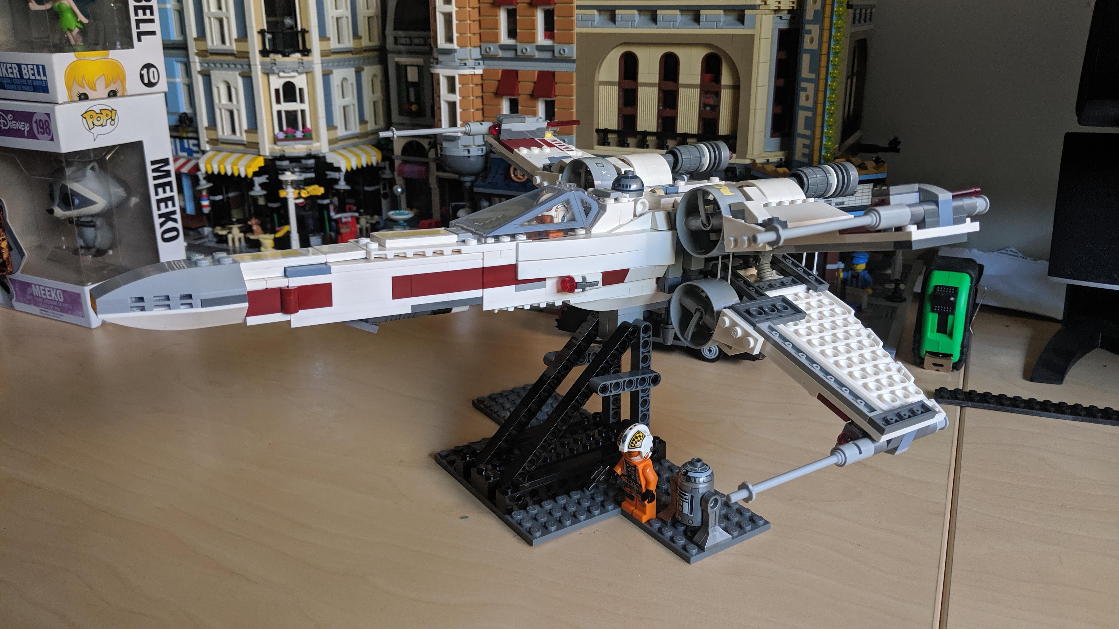 Built a custom stand for the latest Star Wars Xwing. It looks so much