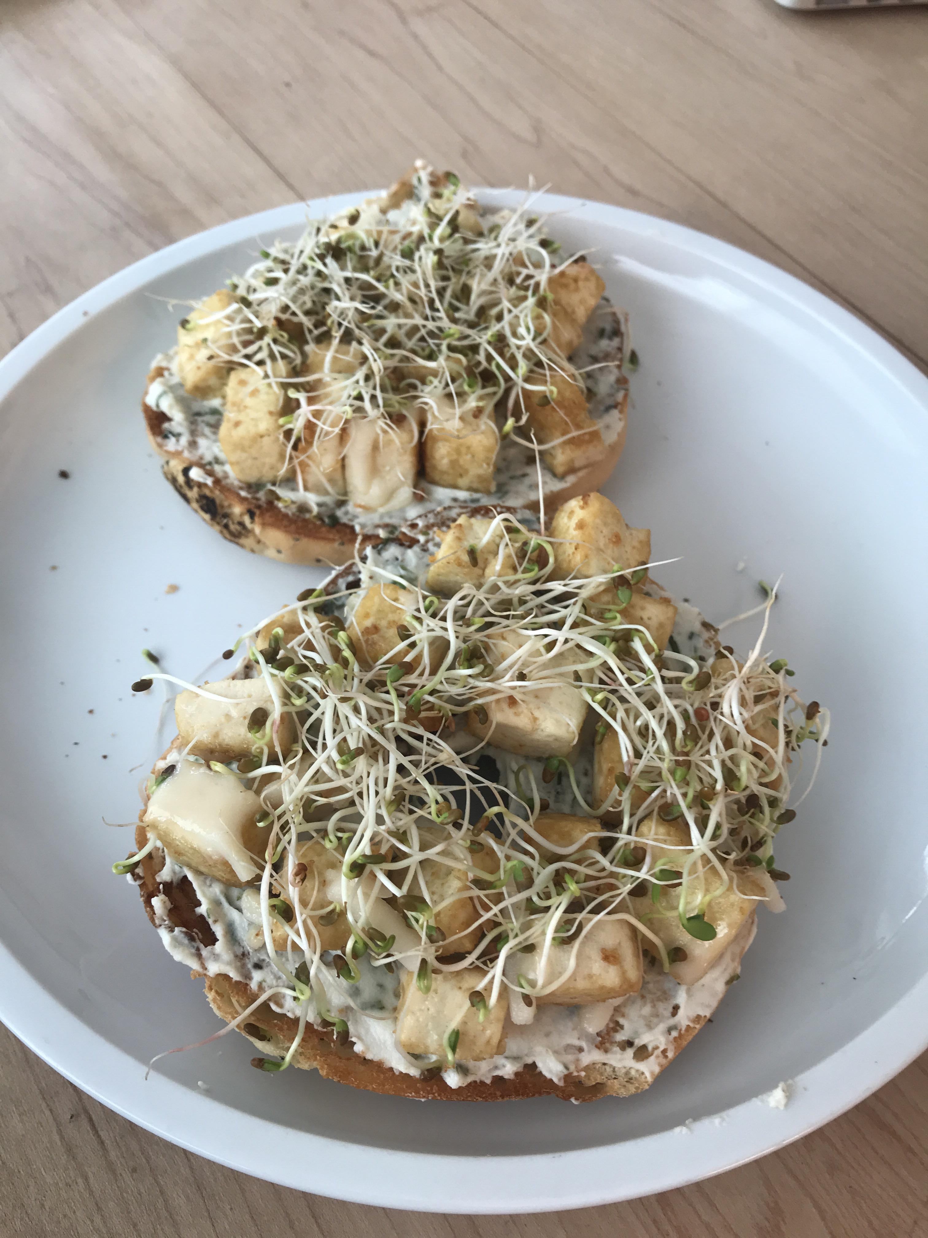 Tofu scramble bagels with vegan mozzarella cheese, Kite Hill cream