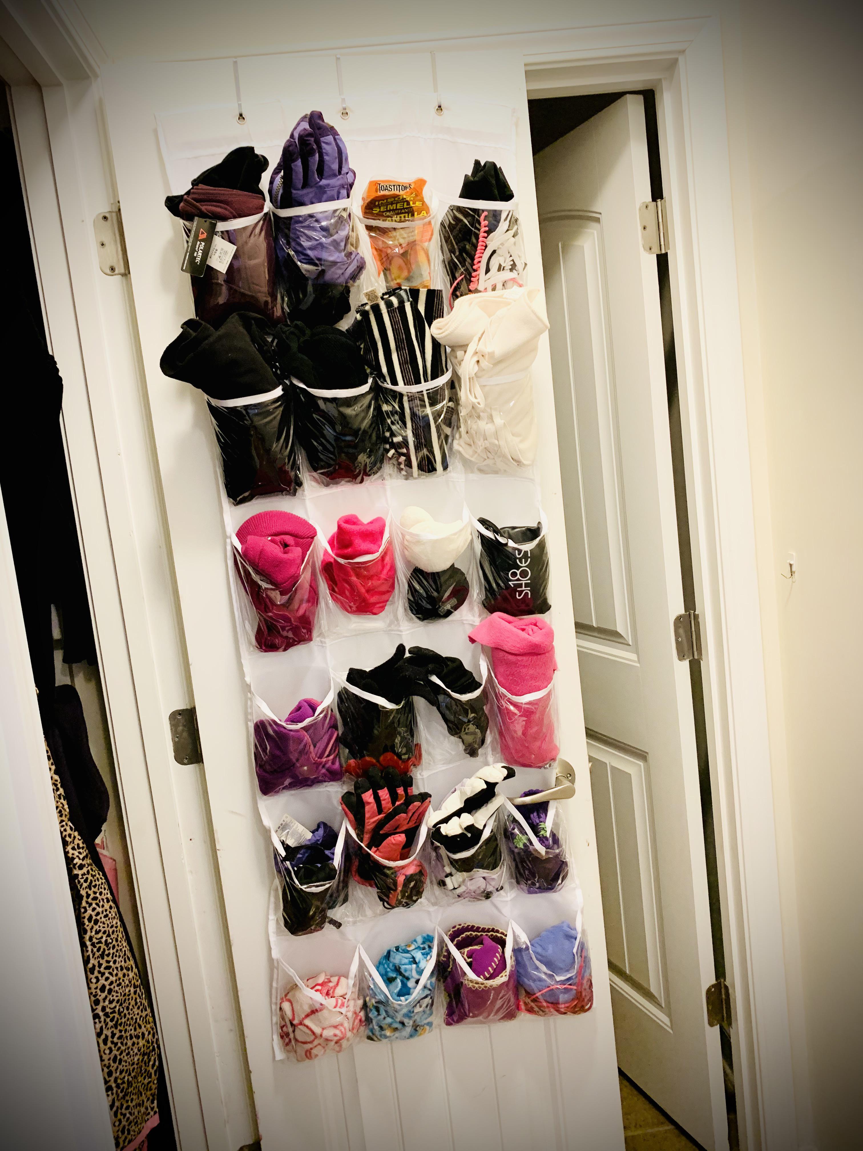 Organize winter accessories using and overthedoor clear pocket shoe