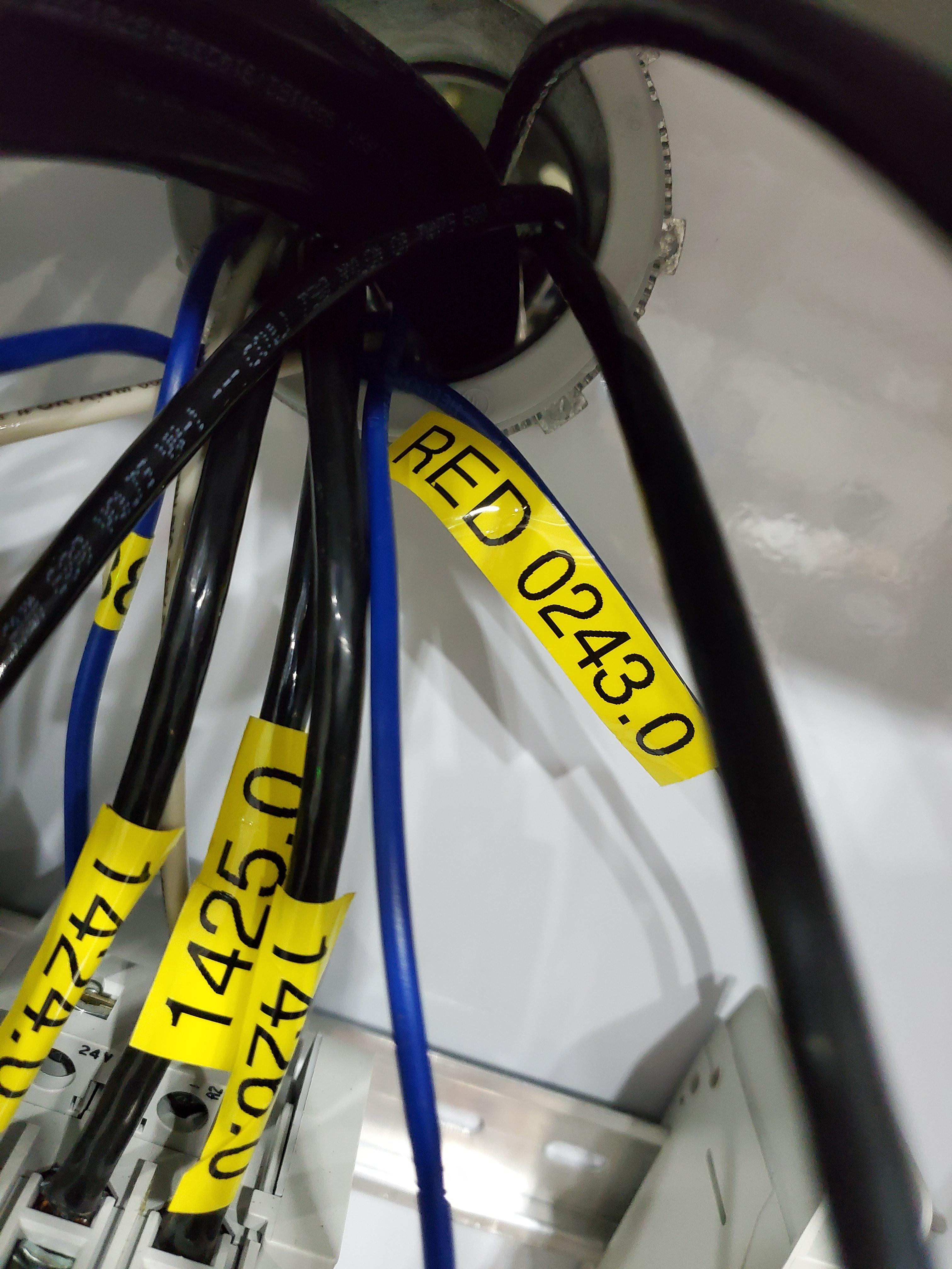 This wire identifies as red and 120v. PLC