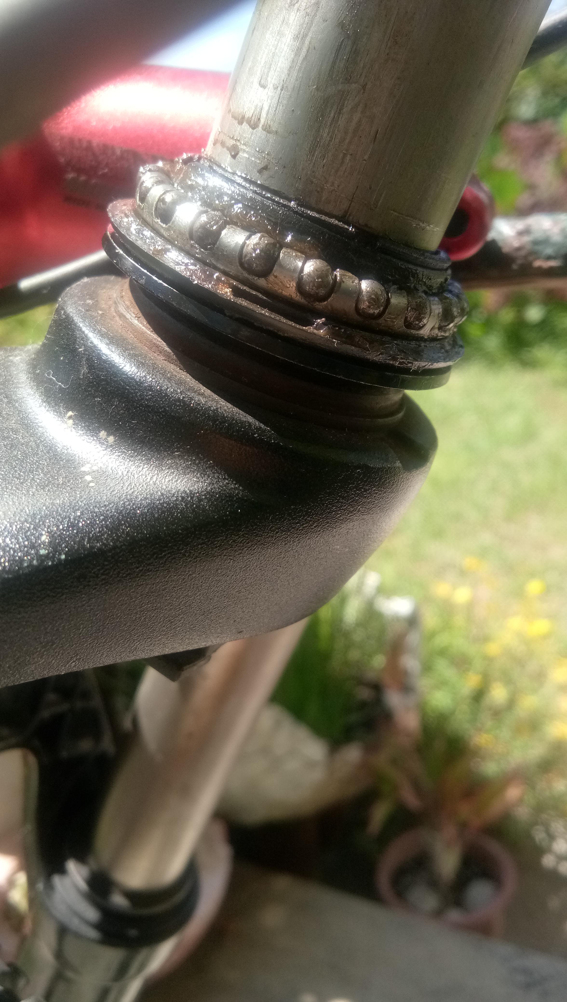 Guys how do I fix this the bearing wont go down all the way and I can't