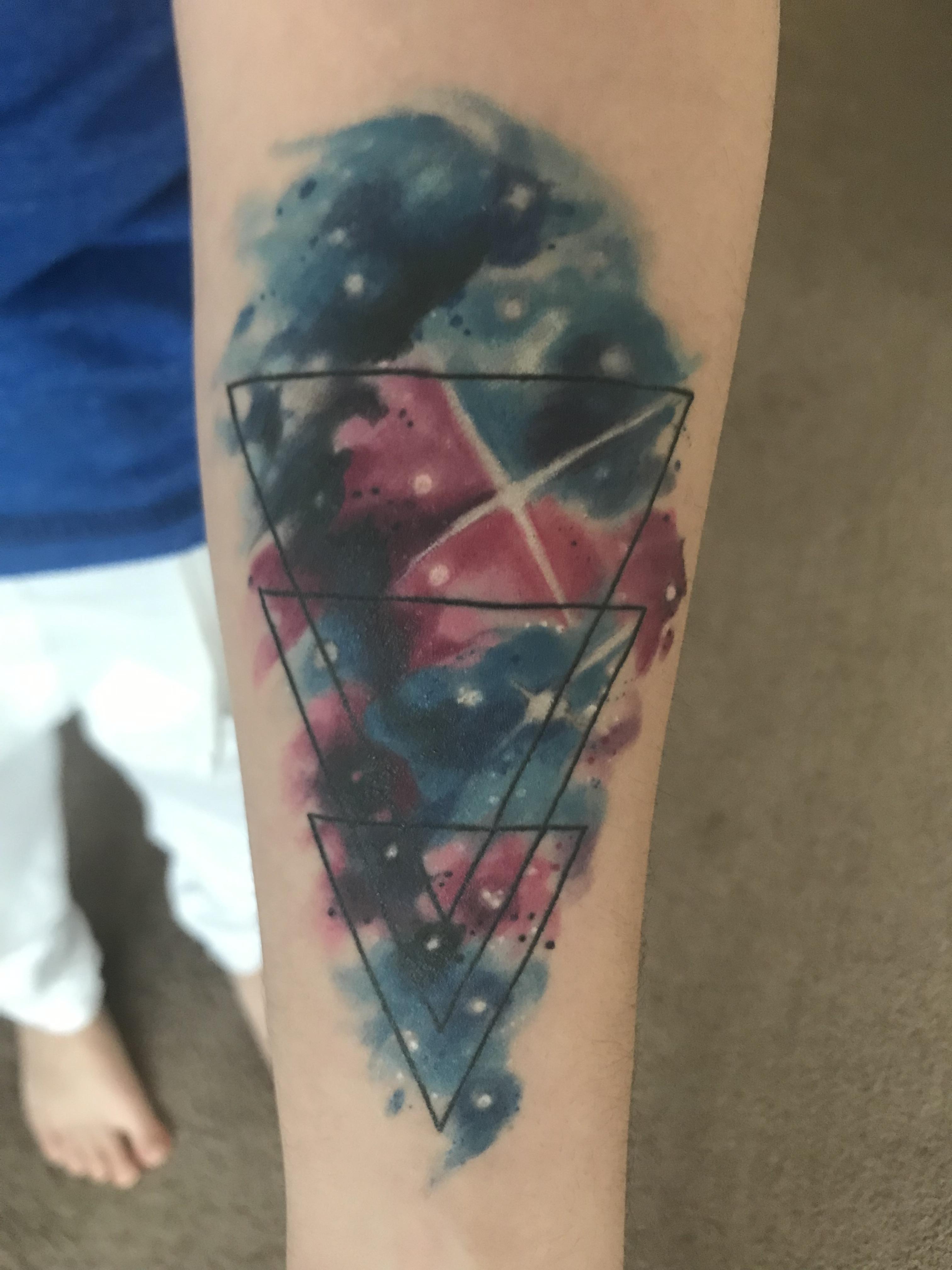 Geometric design with a watercolor galaxy. Done by Nina at