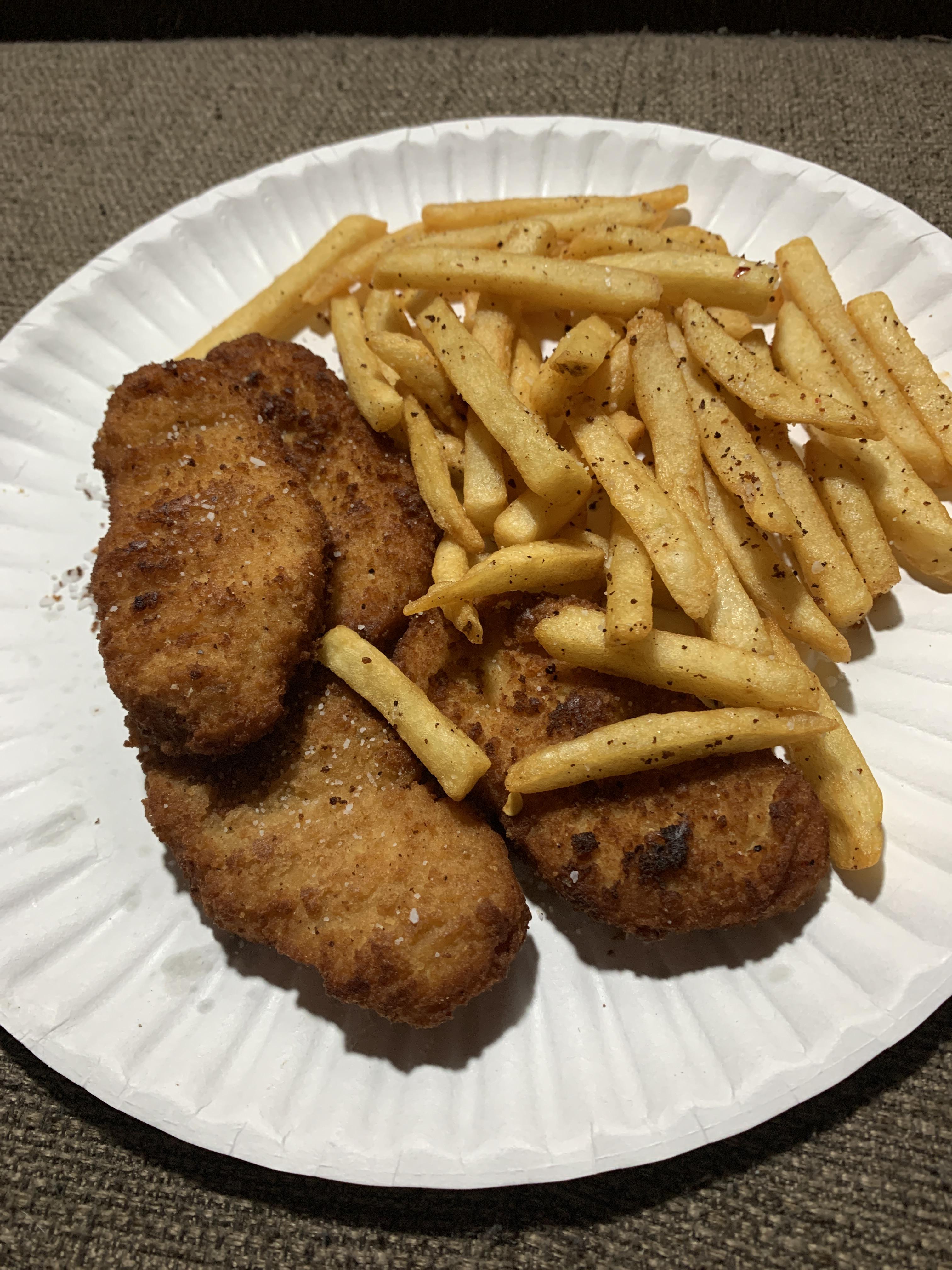 Frozen chicken strips and French fries fried in butter. Happy