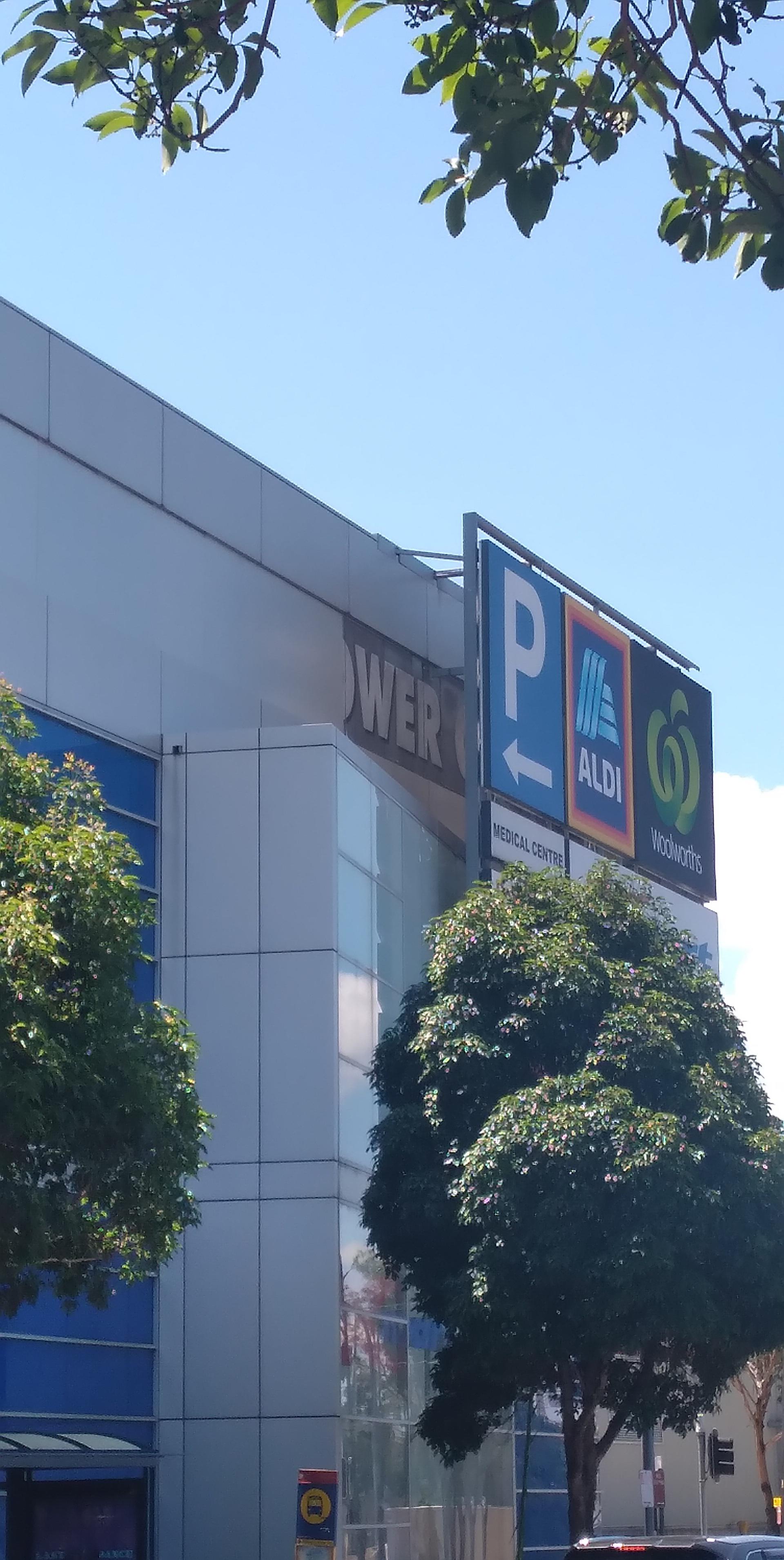 What are those words hiding beneath the shopping logo stuff? (Taken at